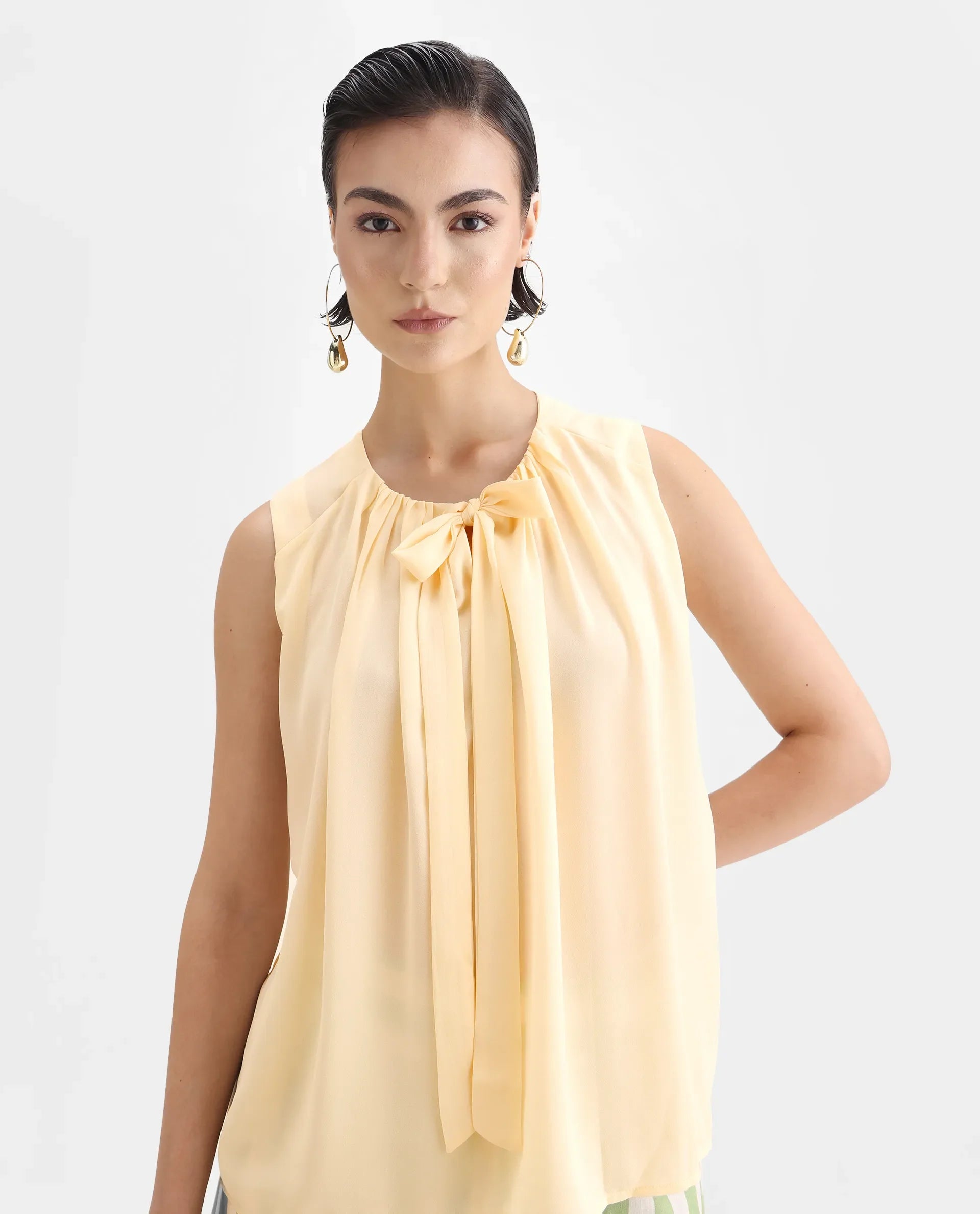 Rareism Women's Beverly Beige Polyester Tie-Up Neck Plain Sleeveless Relaxed Fit Top