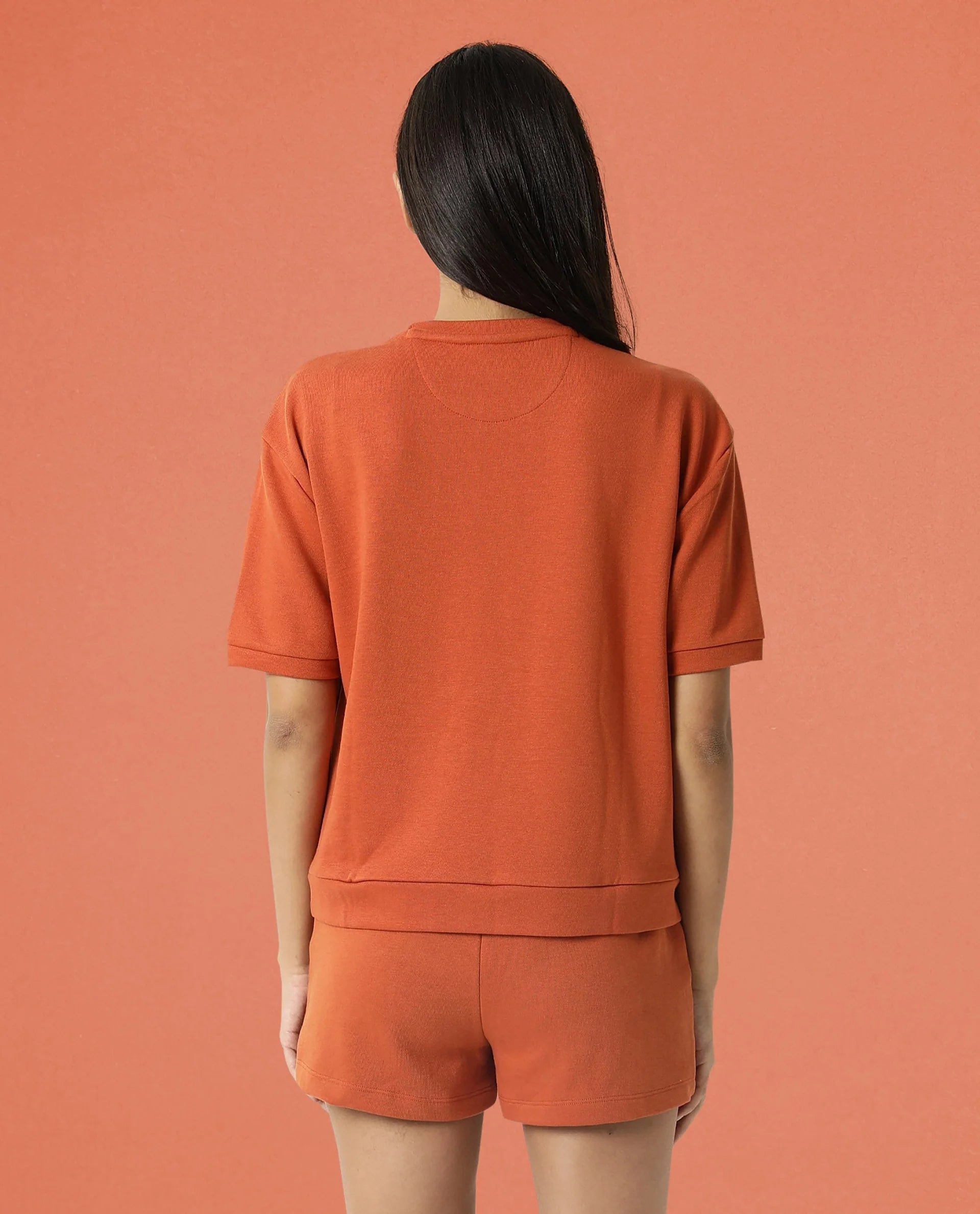 Rareism Women Coco Orange Cotton Fabric Half Sleeves Relaxed Fit Solid Round Neck Sweat Tee
