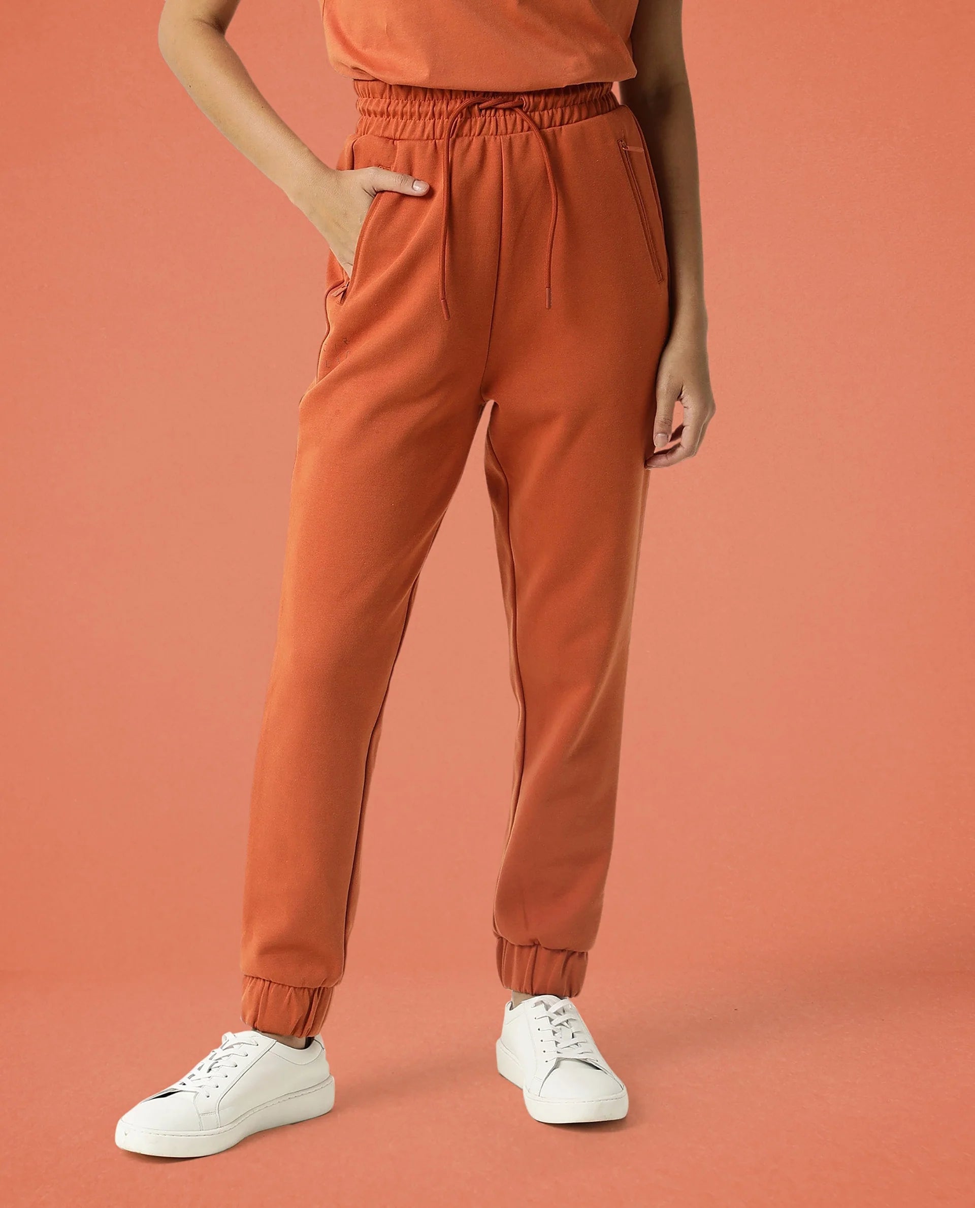 Rareism Women Creta Orange Cotton Blend Fabric Relaxed Fit Solid Mid Rise Ankle Length Track Pant