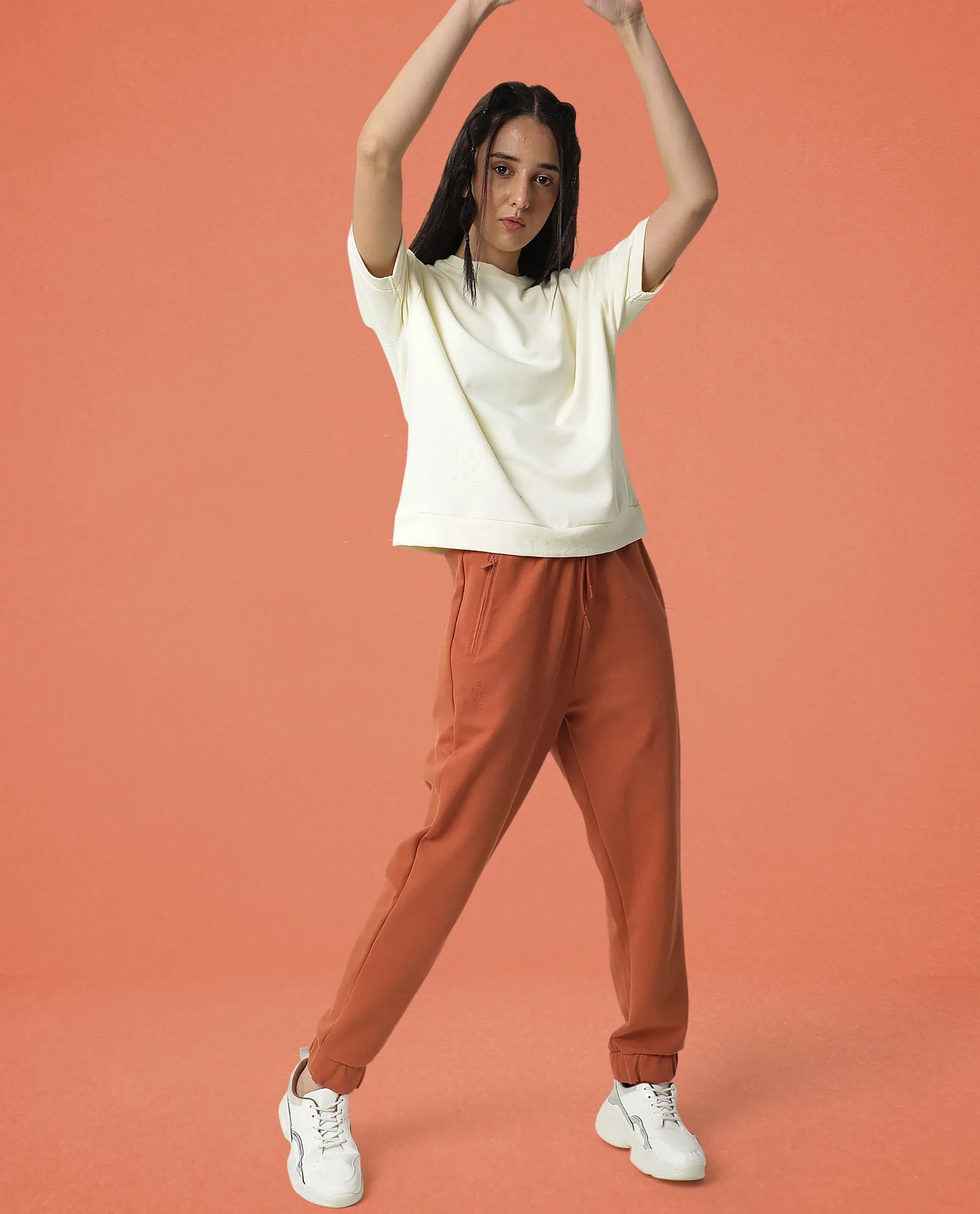 Rareism Women Creta Orange Cotton Blend Fabric Relaxed Fit Solid Mid Rise Ankle Length Track Pant