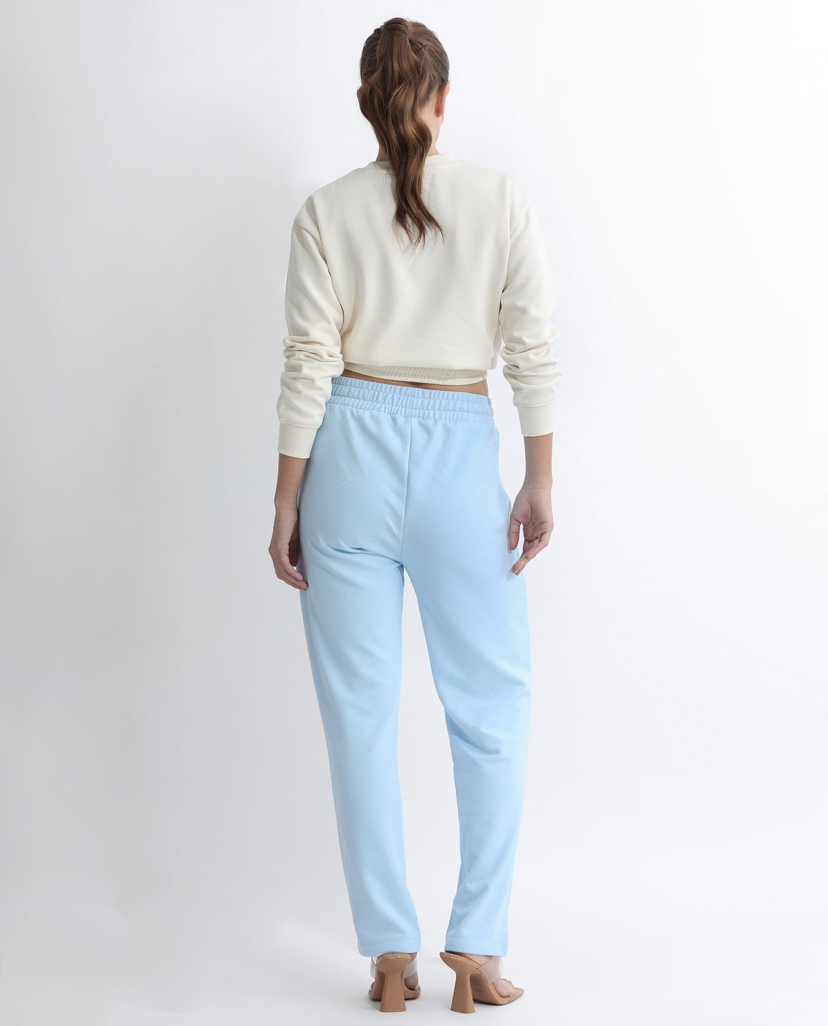Rareism Women Fronk Light Blue Poly Cotton Fabric Tailored Fit Solid Mid Rise Ankle Length Track Pant