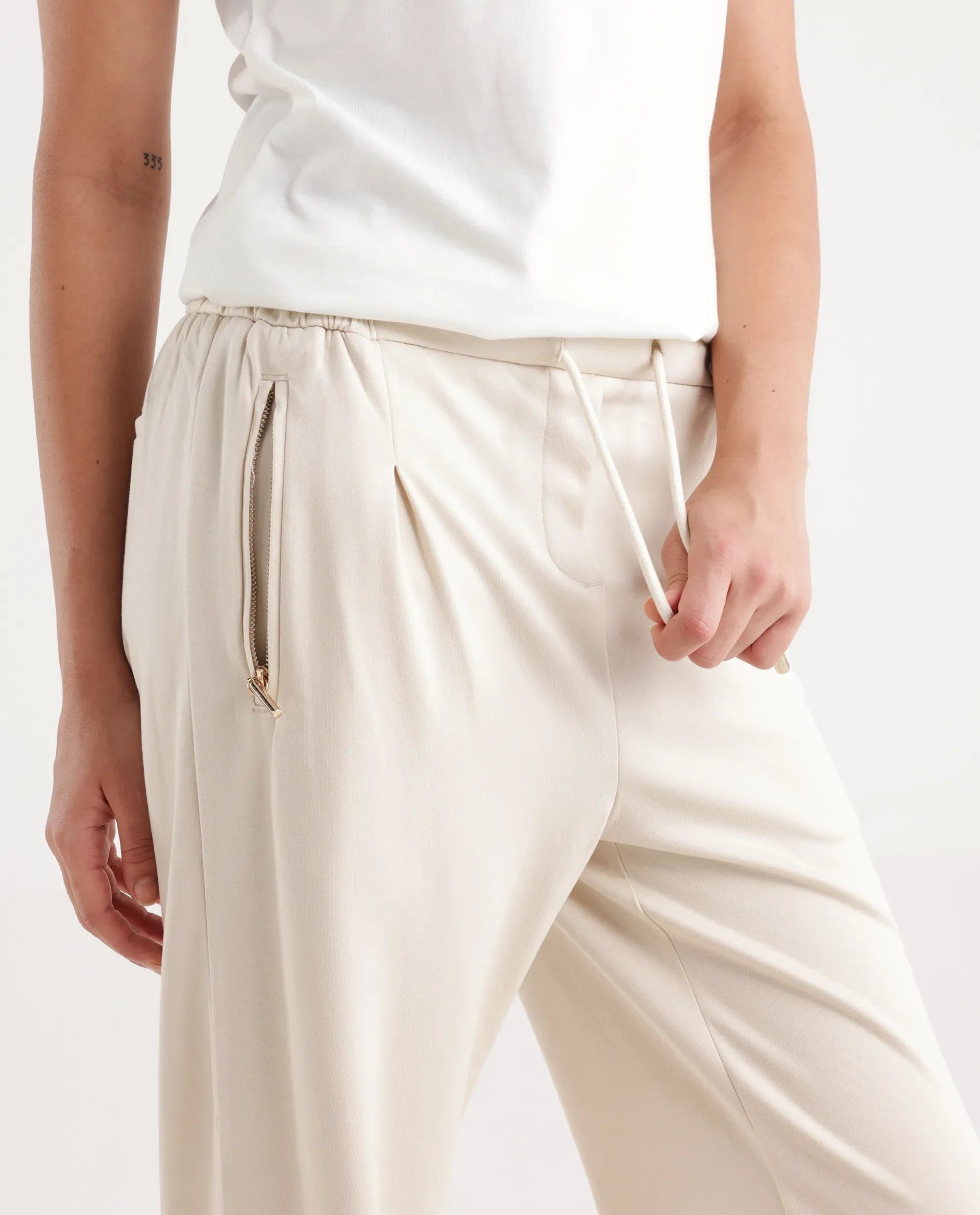 Rareism Women's Gumushane Off White Modal Blend Plain Ankle Length Straight Fit Track Pant