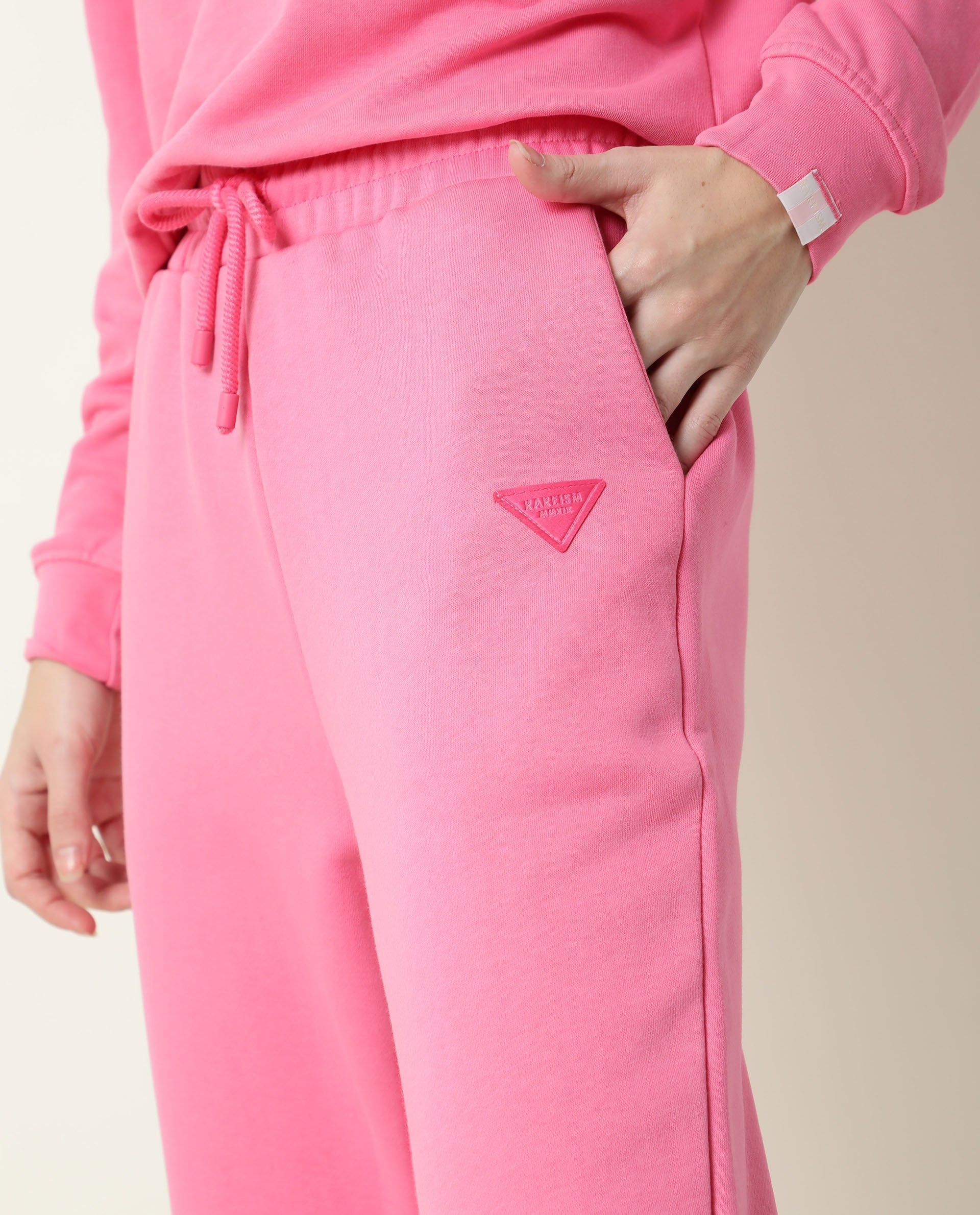 Rareism Women Neo-1 Pink Poly Cotton Fabric Tailored Fit Solid Mid Rise Ankle Length Track Pant