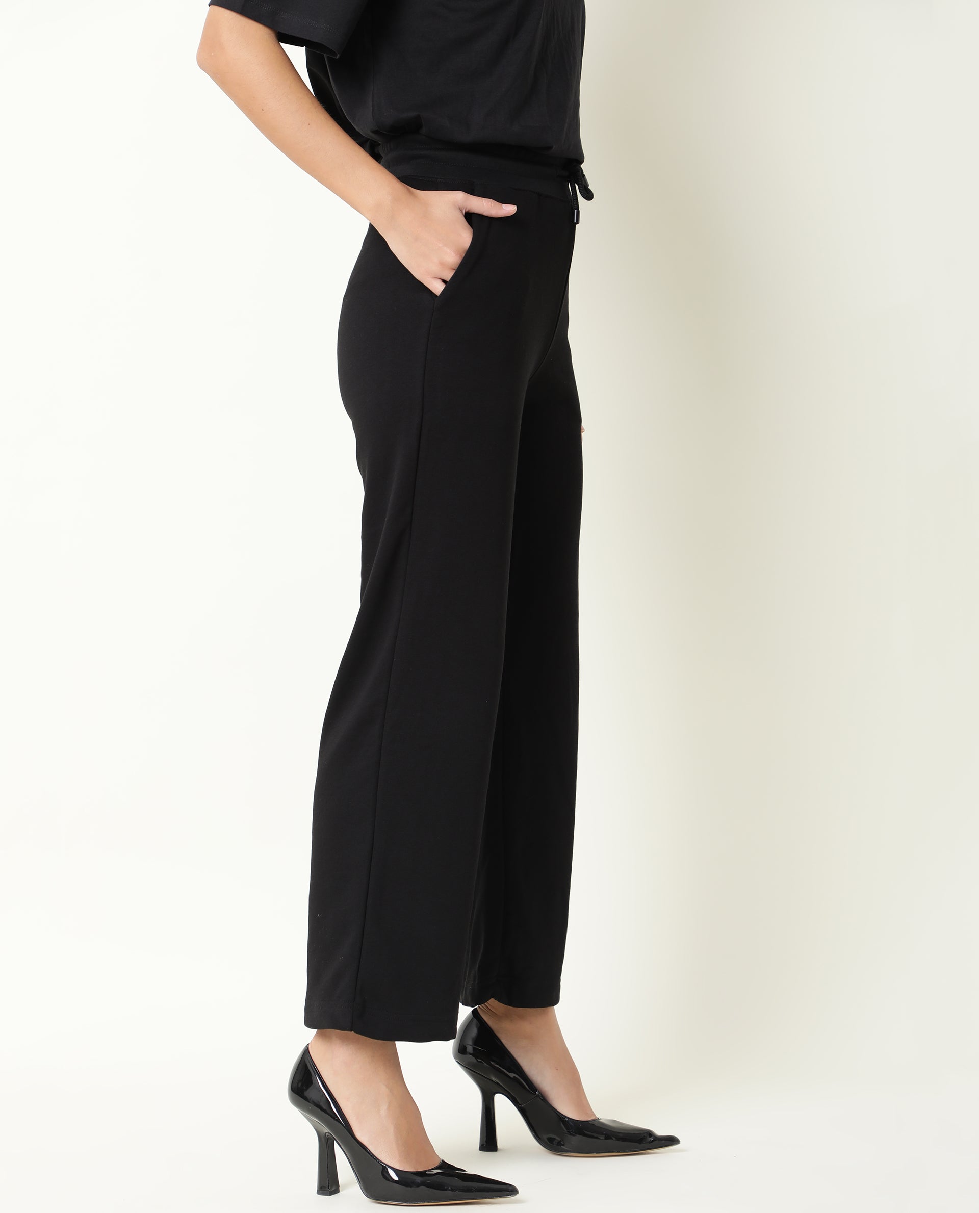 Rareism Women Pazo-1 Black Poly Cotton Fabric Relaxed Fit Solid Mid Rise Ankle Length Track Pant