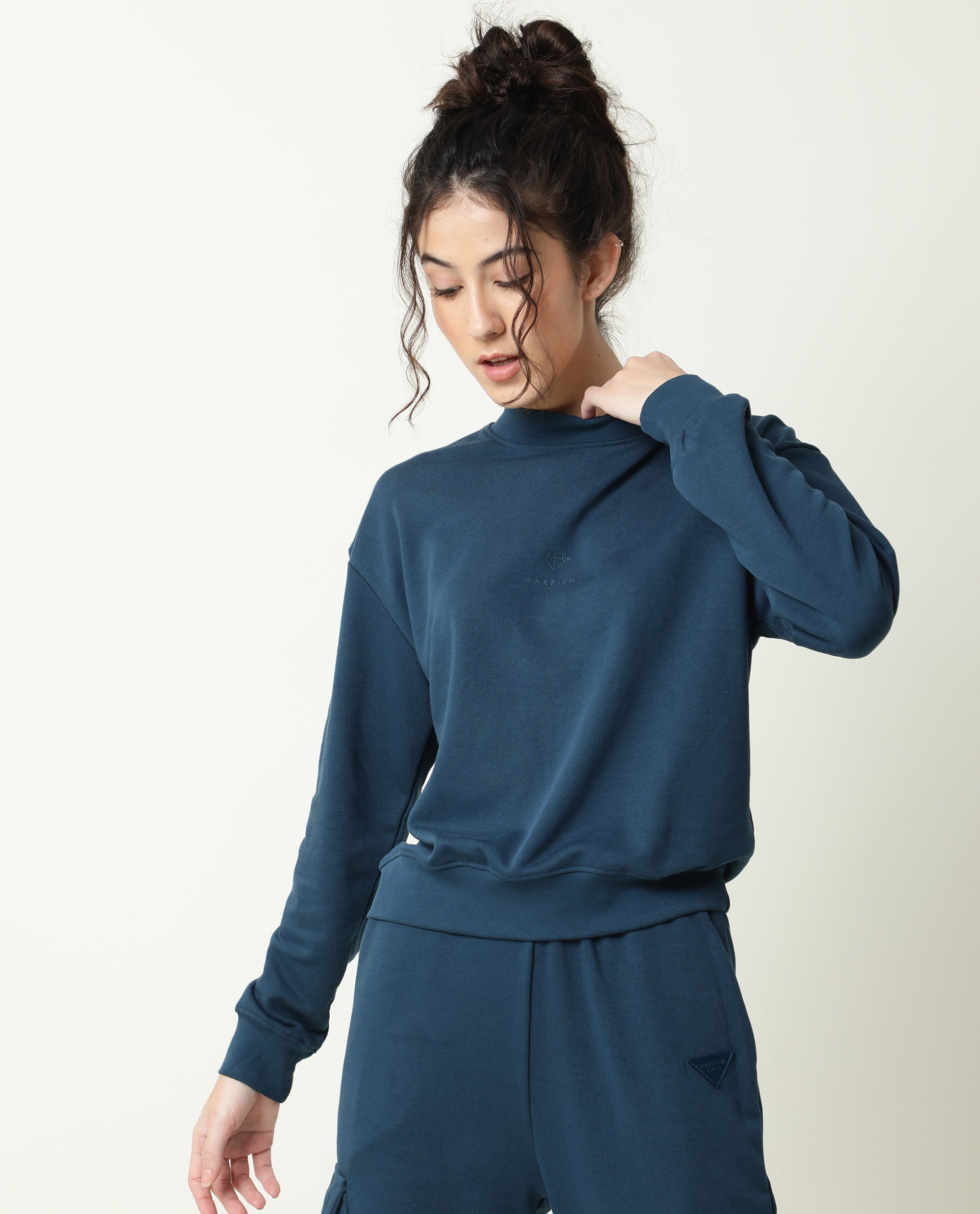Rareism Women Necker Petrol Relaxed Fit Full Sleeves Solid High Neck Sweatshirt