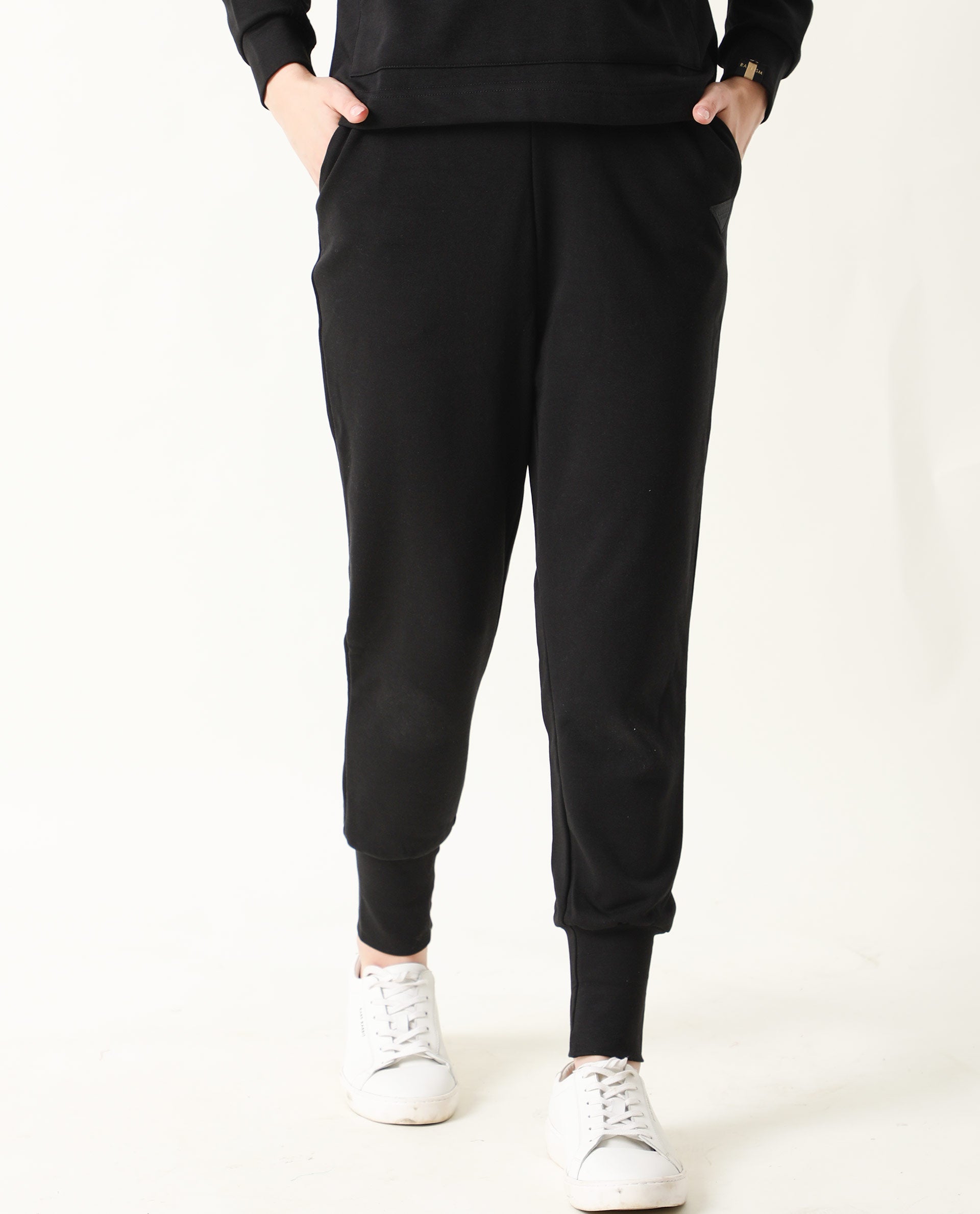 Rareism Women Simp-1 Black Poly Cotton Fabric Regular Fit Solid Mid Rise Ankle Length Track Pant