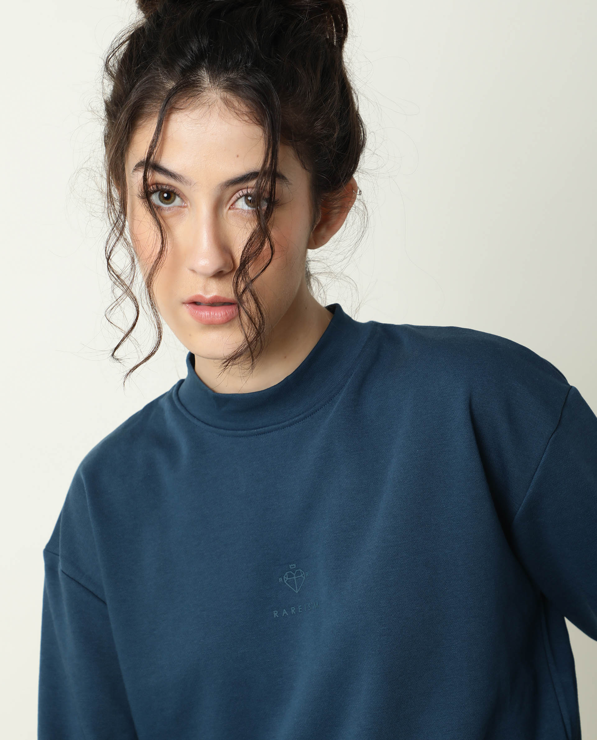 Rareism Women Necker Petrol Relaxed Fit Full Sleeves Solid High Neck Sweatshirt