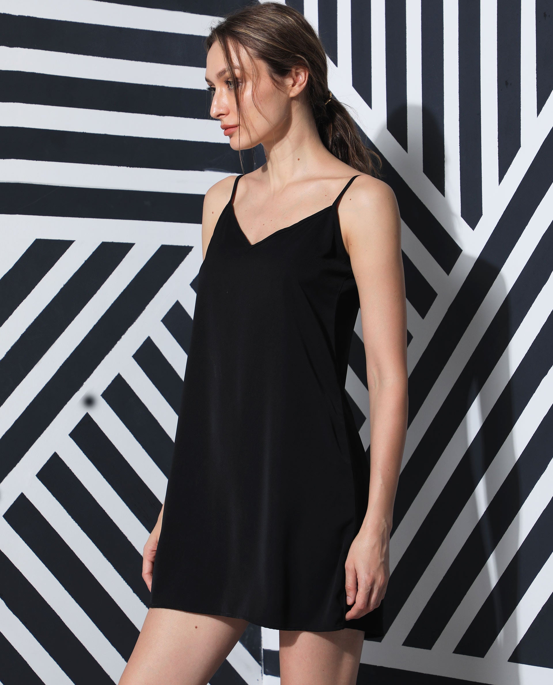 Rareism Women's Slipos Black Polyester V-Neck Plain Shoulder Strap Knee Length Regular Fit Inner Wear