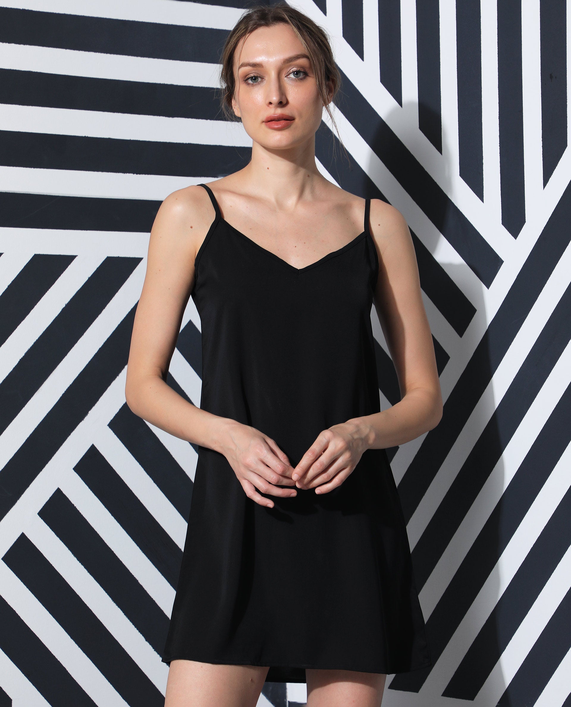Rareism Women's Slipos Black Polyester V-Neck Plain Shoulder Strap Knee Length Regular Fit Inner Wear