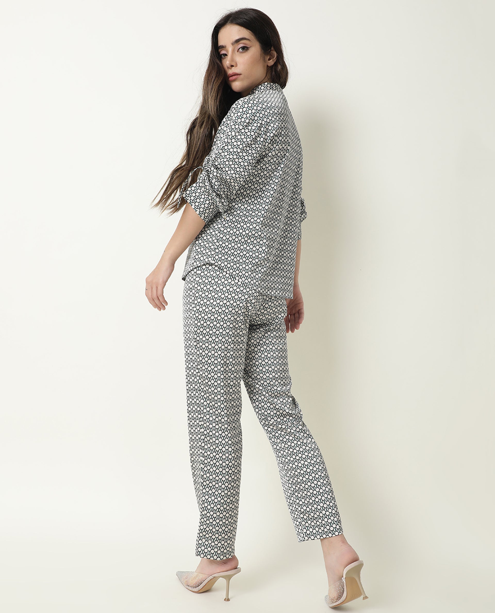 Rareism Women Malani Beige Modal Fabric Tailored Fit Mid Rise Geometric Print Ankle Length Trousers