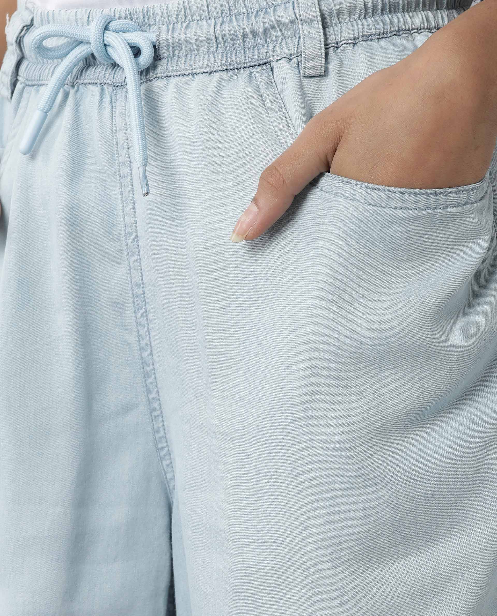 Rareism Women Lipo Light Blue Tencel Fabric Relaxed Fit High Rise Solid Ankle Length Trousers