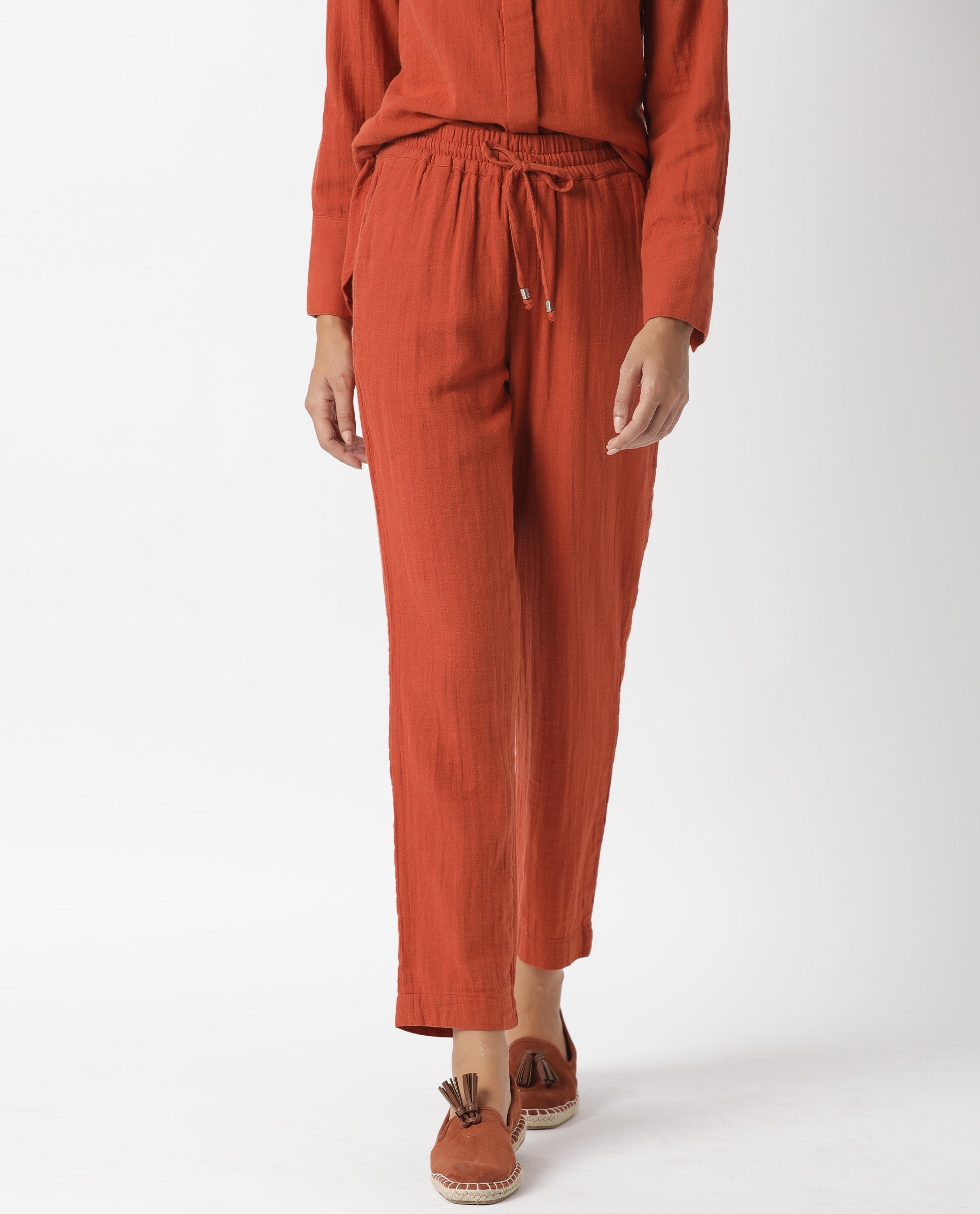 Rareism Women Elo Dark Rust Cotton Fabric Regular Fit Mid Rise Solid Ankle Length Trousers