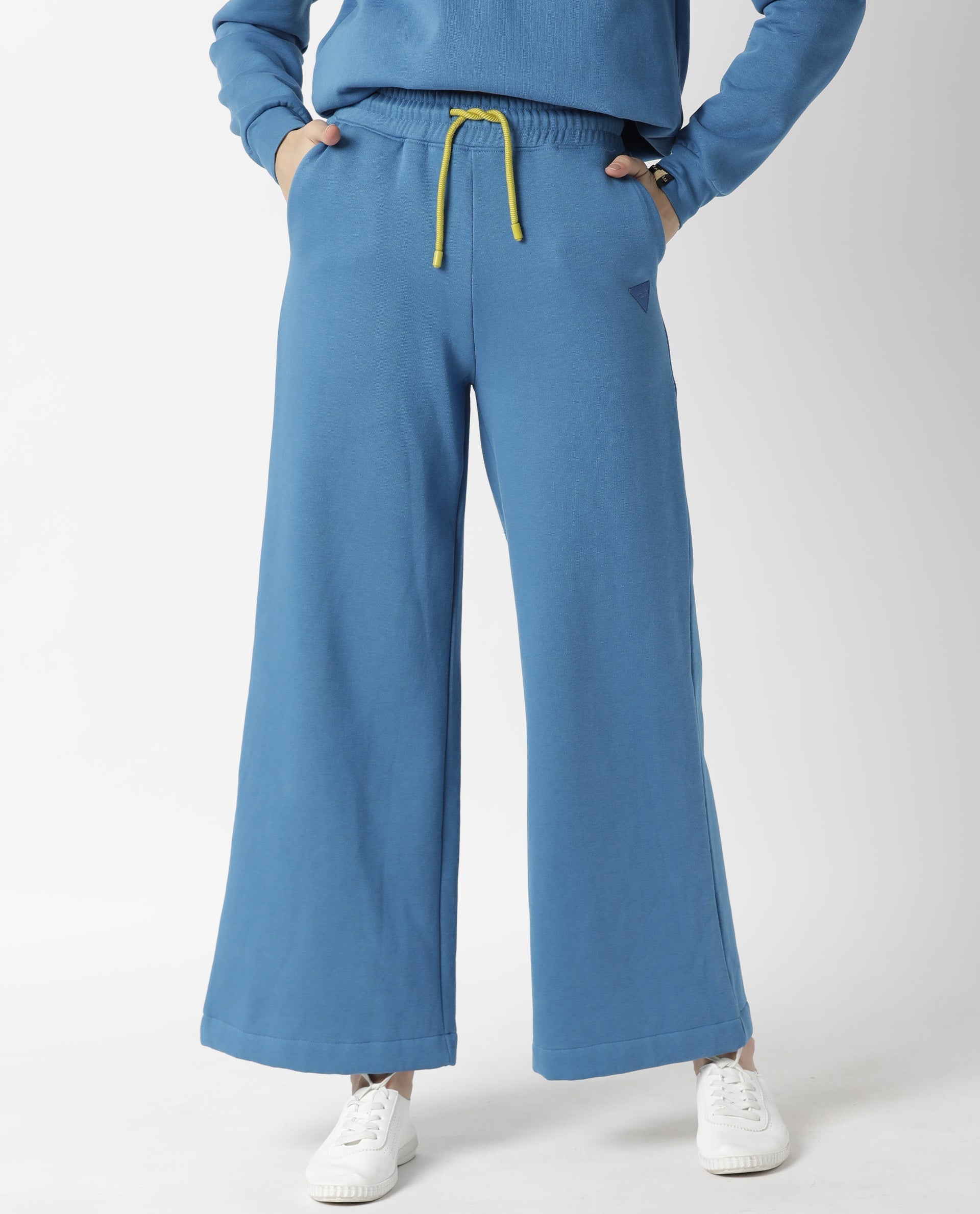 Rareism Women Pazo-1 Blue Poly Cotton Fabric Relaxed Fit Solid Mid Rise Ankle Length Track Pant