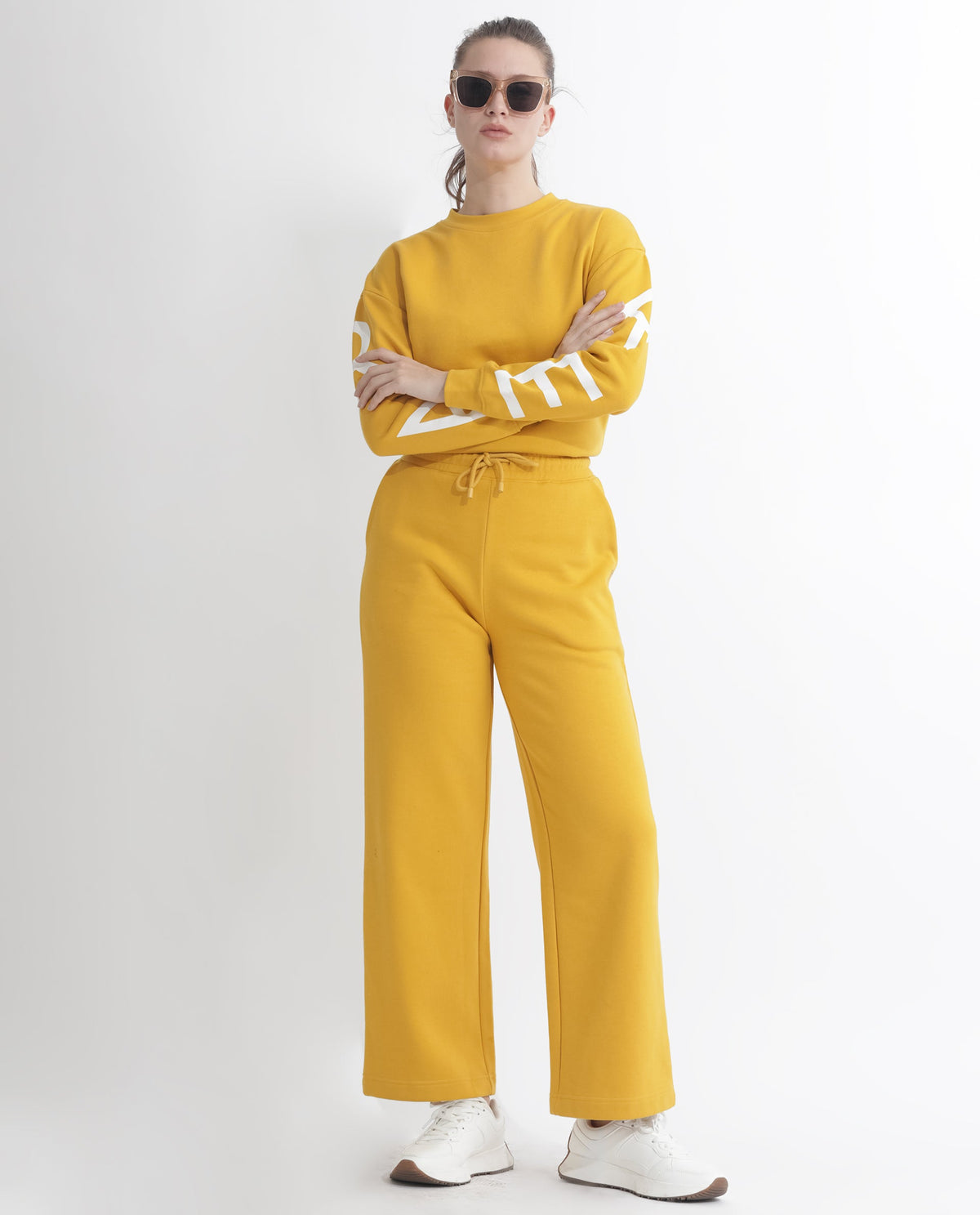 Rareism Women Pazoo F Mustard Cotton Blend Fabric Flared Solid Mid Rise Ankle Length Track Pant