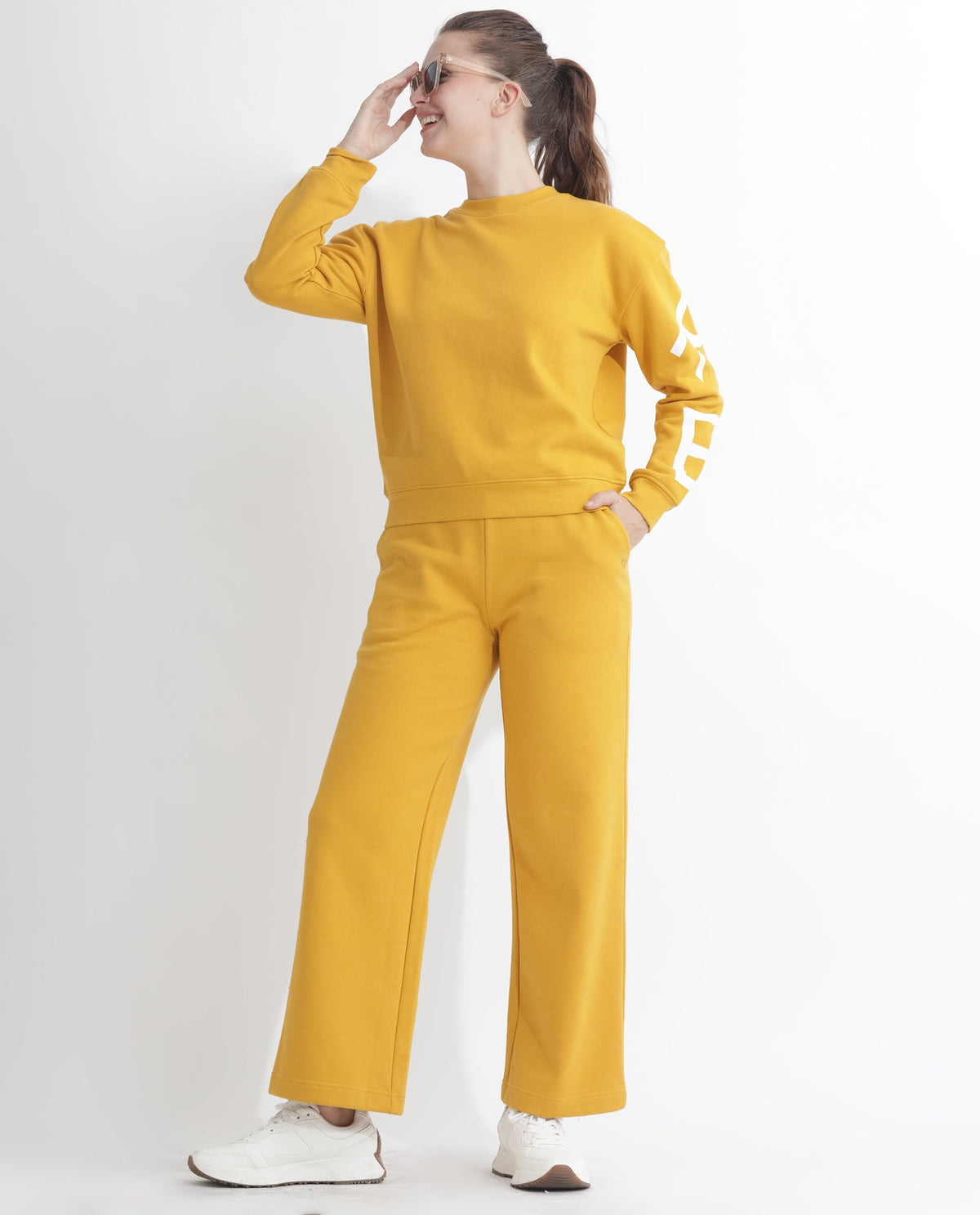 Rareism Women Pazoo F Mustard Cotton Blend Fabric Flared Solid Mid Rise Ankle Length Track Pant