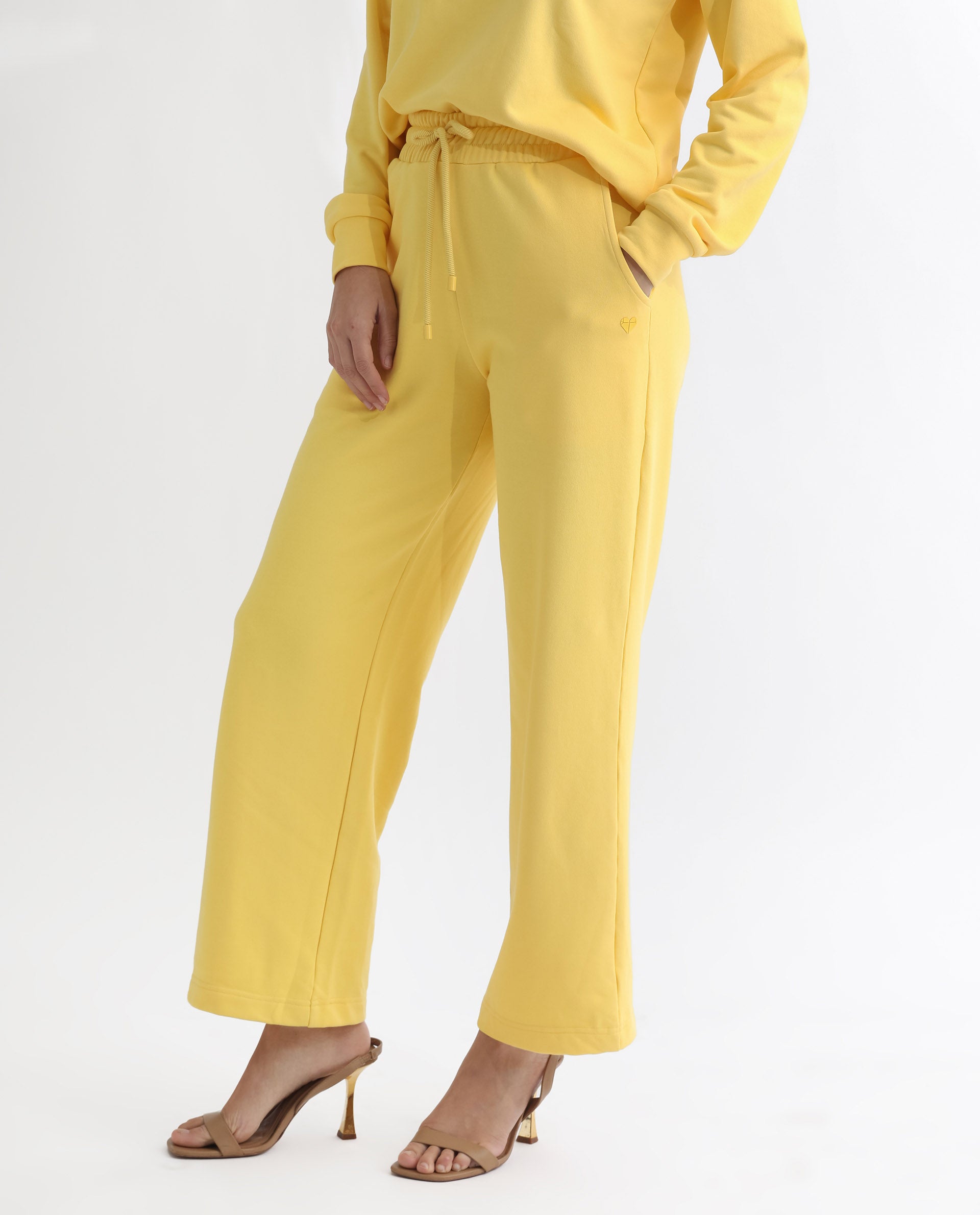 Rareism Women's Pazoo T Yellow Cotton Blend Plain Ankle Length Flared Track Pant