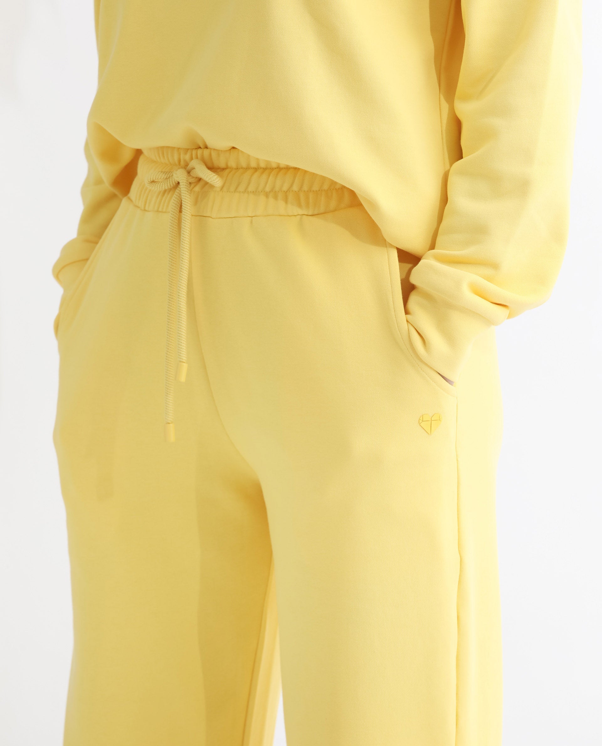 Rareism Women's Pazoo T Yellow Cotton Blend Plain Ankle Length Flared Track Pant
