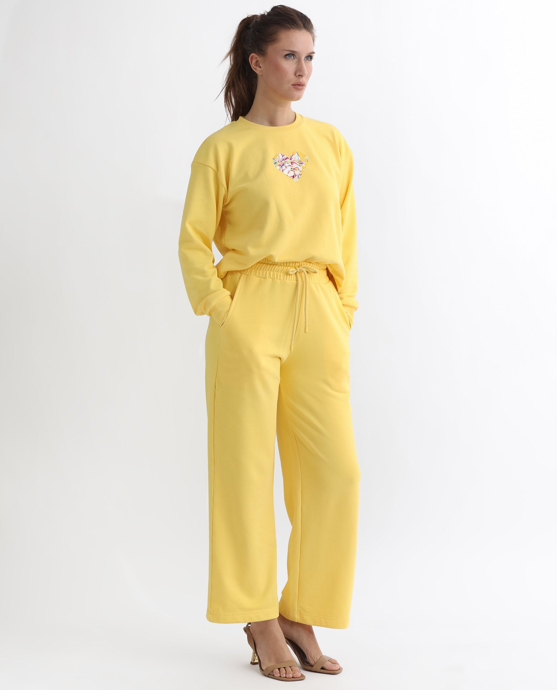 Rareism Women's Pazoo T Yellow Cotton Blend Plain Ankle Length Flared Track Pant