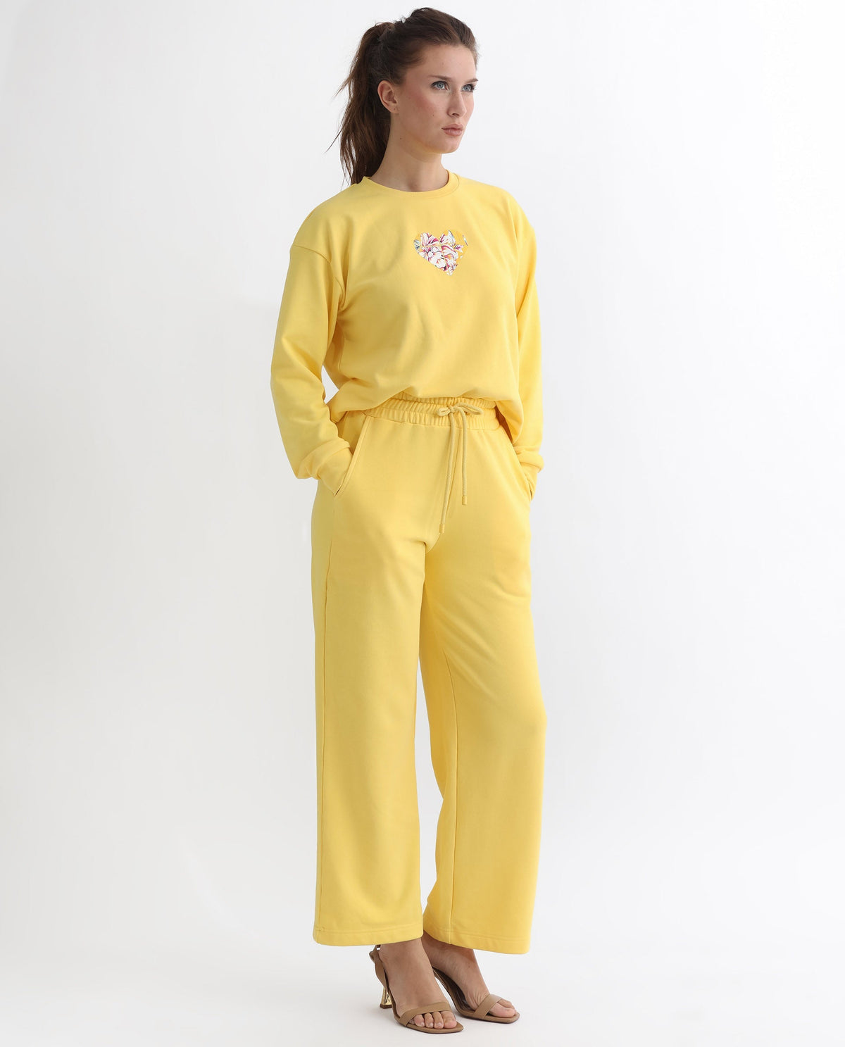 Rareism Articale Women Pazoo T Yellow Cotton Blend Fabric Drawstring Closure Flared Fit Plain Ankle Length Track Pant