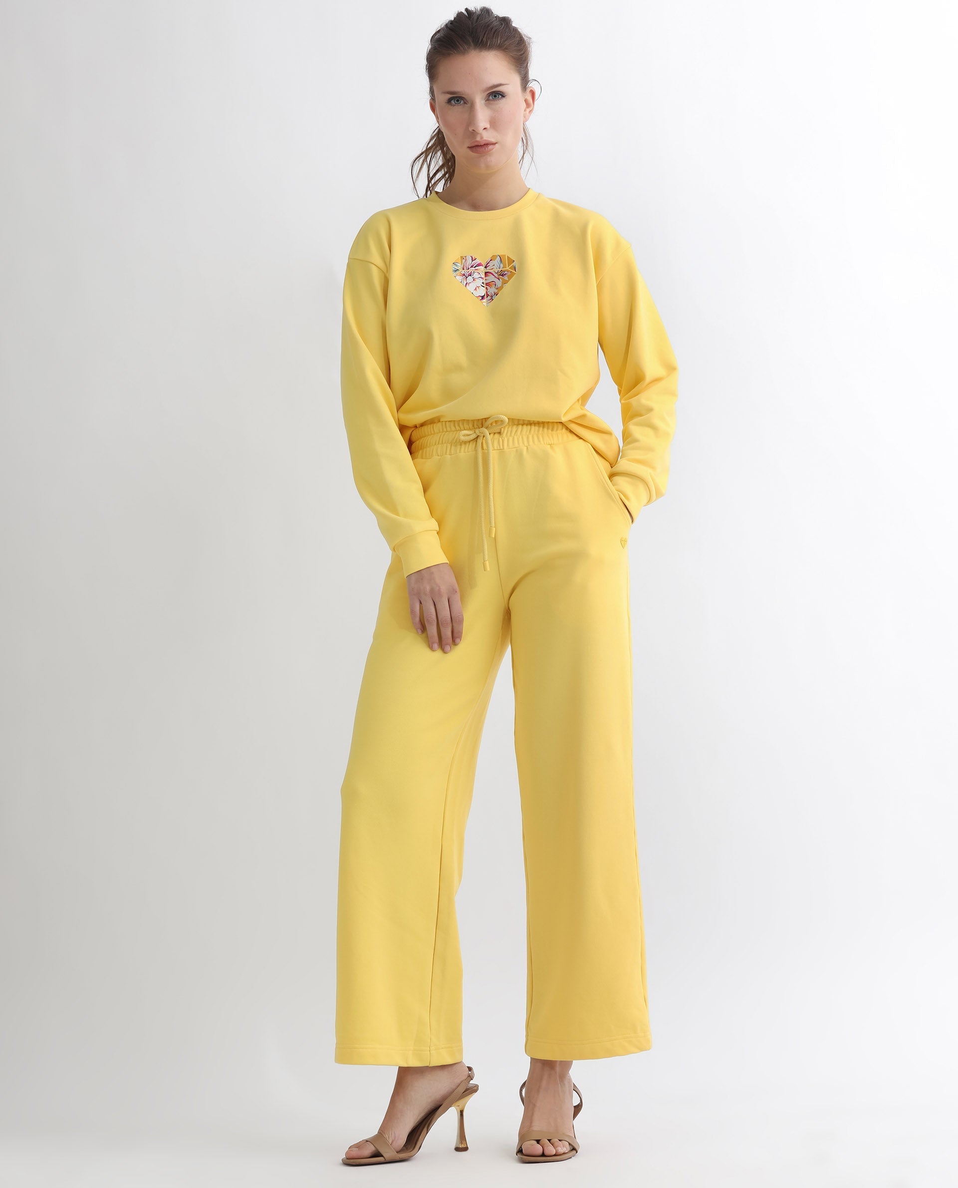 Rareism Women's Pazoo T Yellow Cotton Blend Plain Ankle Length Flared Track Pant