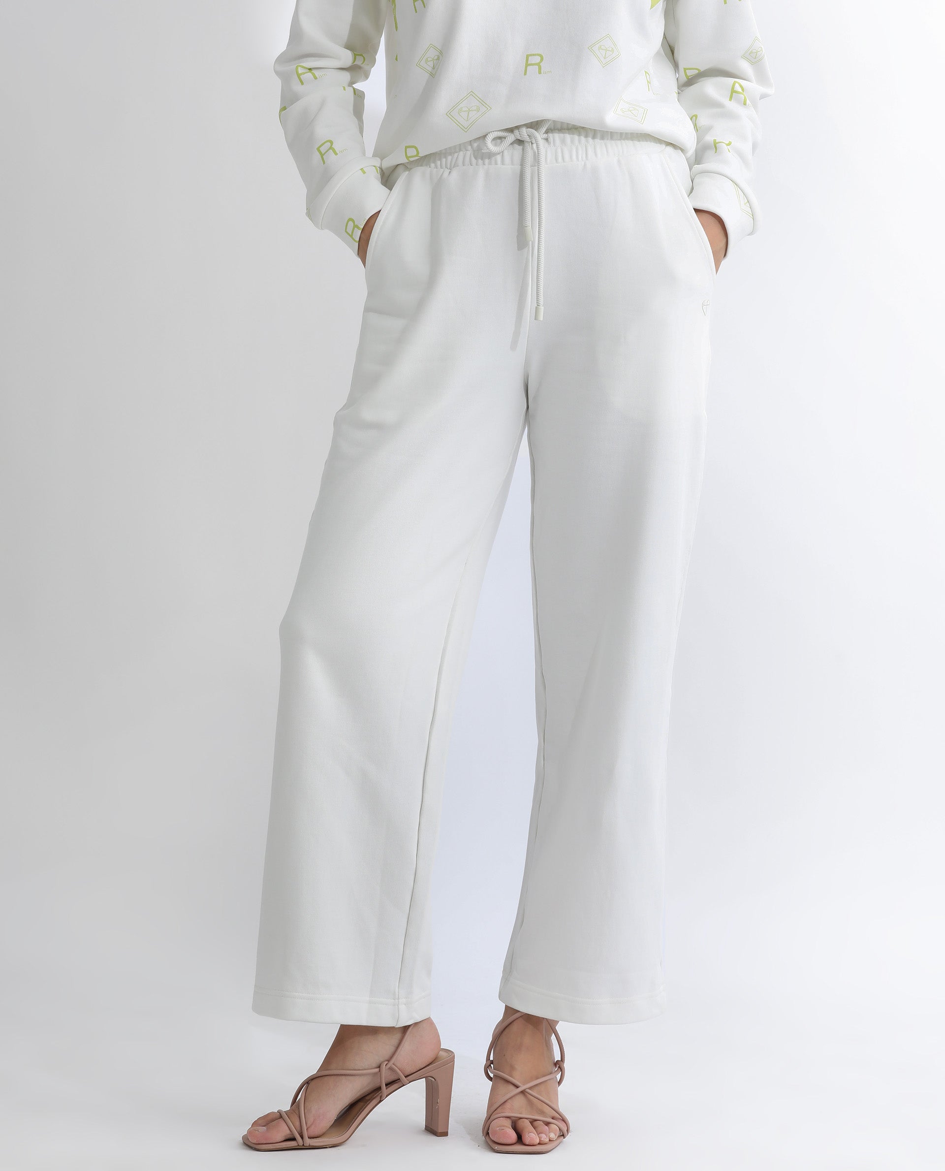 Rareism Women's Pazoo T Off White Cotton Blend Plain Ankle Length Flared Track Pant