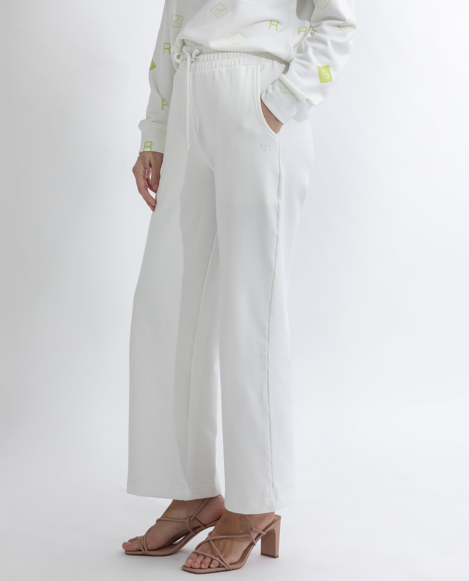 Rareism Women's Pazoo T Off White Cotton Blend Plain Ankle Length Flared Track Pant