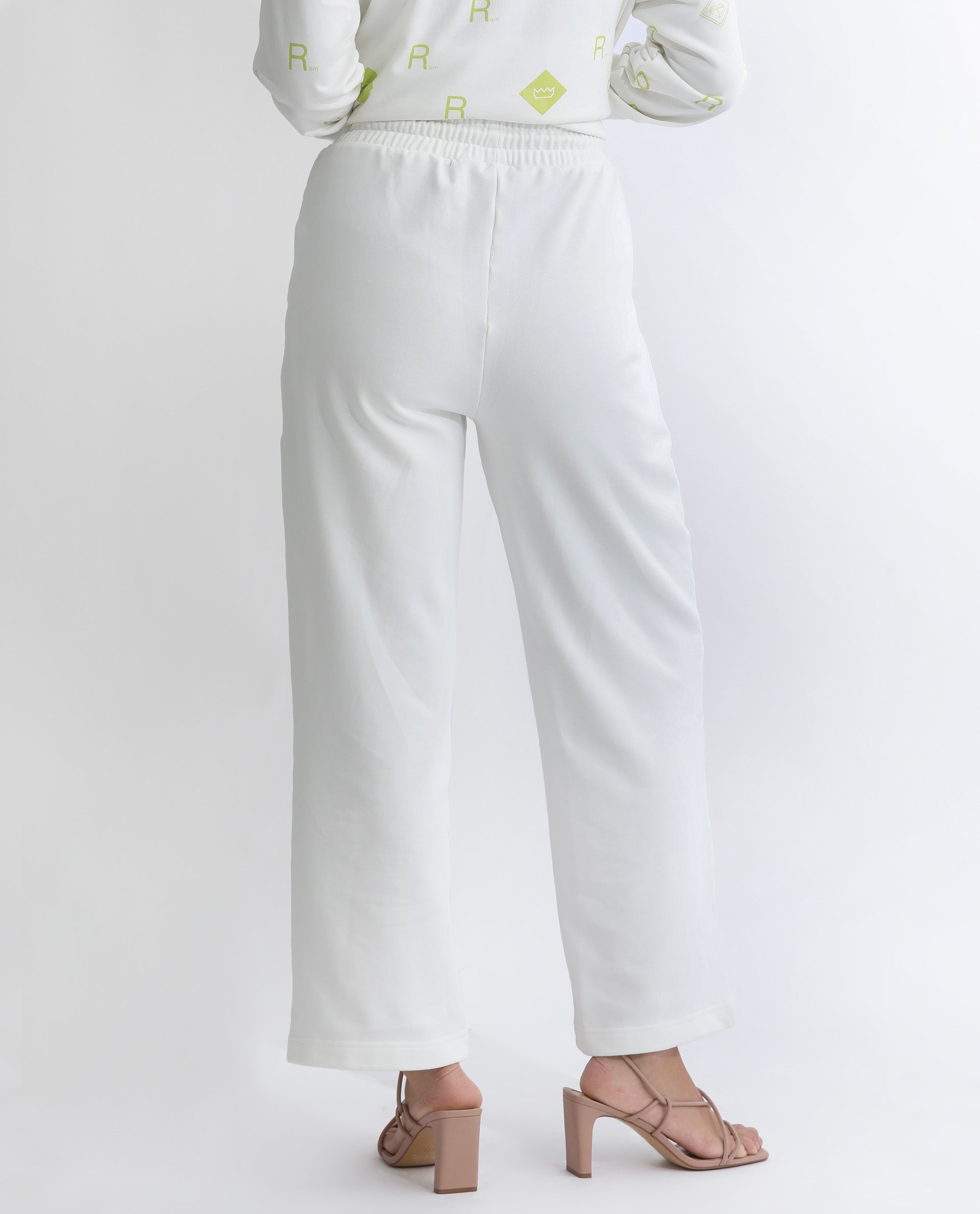 Rareism Women Pazoo T Off White Cotton Blend Fabric Flared Solid Mid Rise Ankle Length Track Pant