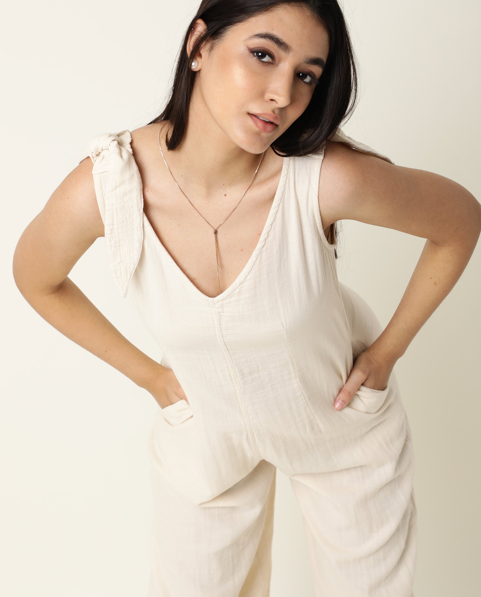 Rareism Women's Peanut Beige Cotton V-Neck Plain Sleeveless Knee Length Tailored Jumpsuit