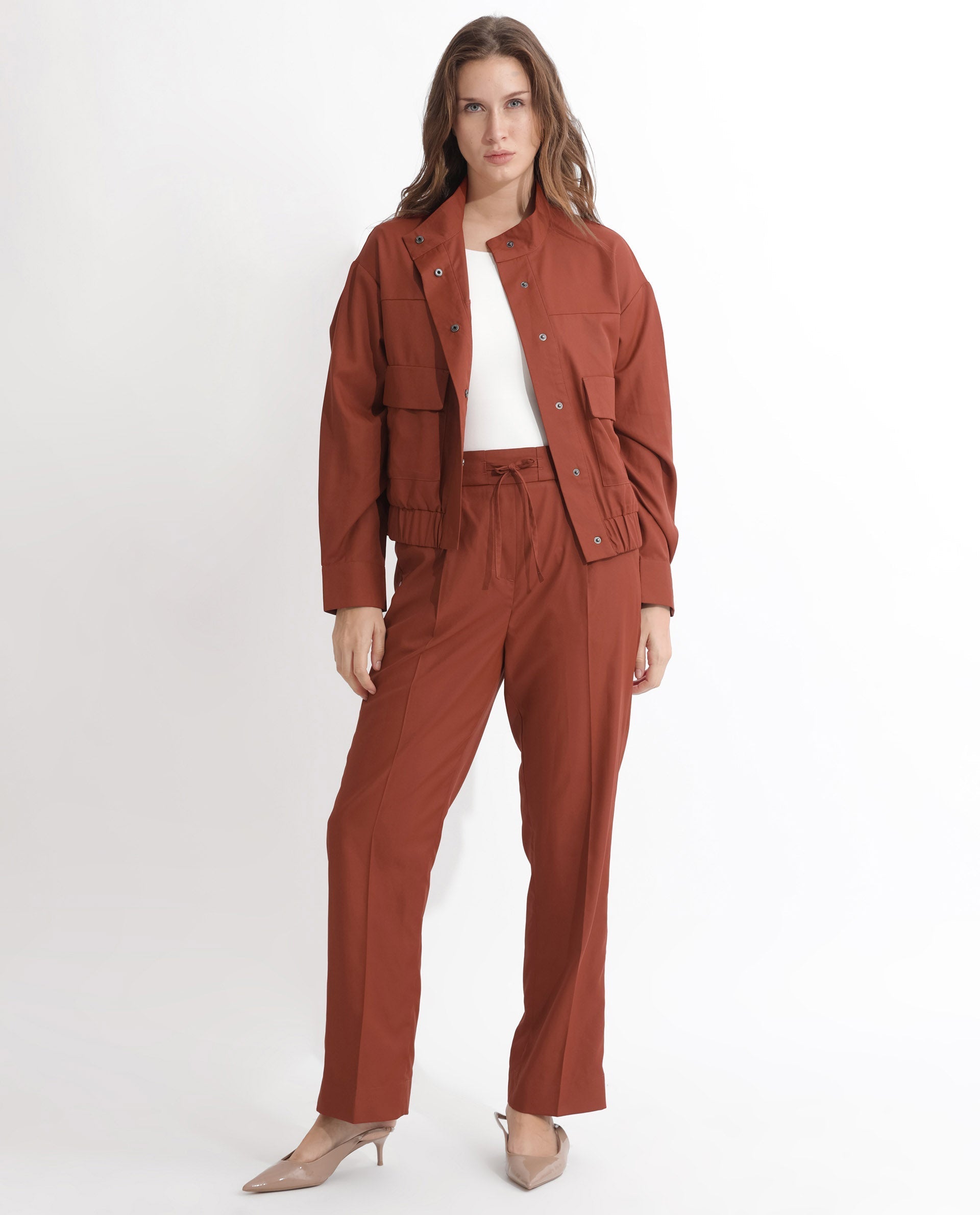 Rareism Articale Women Ruks Rust Polyester Fabric Full Sleeves Button Closure High Neck Regular Fit Plain Jacket