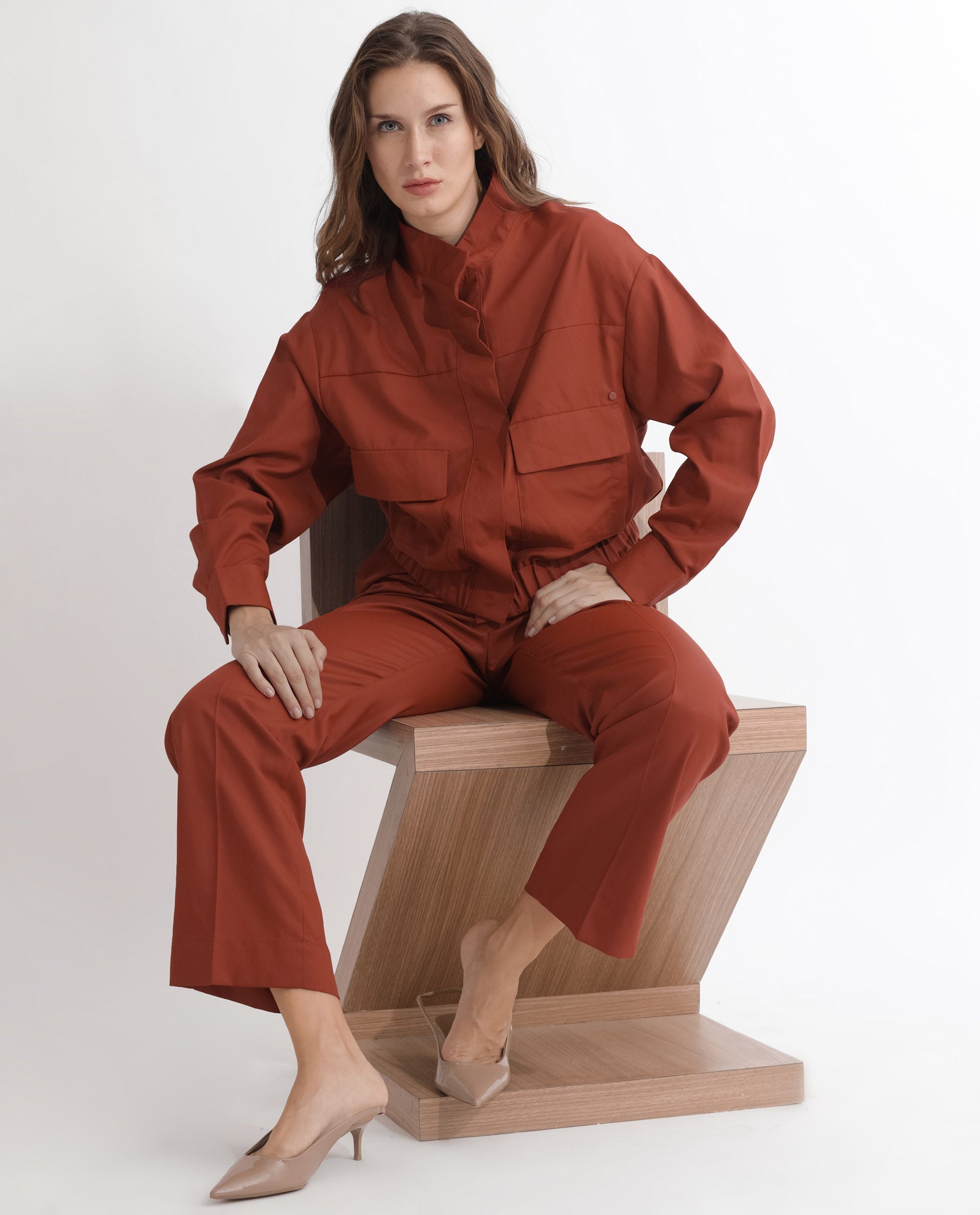 Rareism Articale Women Ruks Rust Polyester Fabric Full Sleeves Button Closure High Neck Regular Fit Plain Jacket