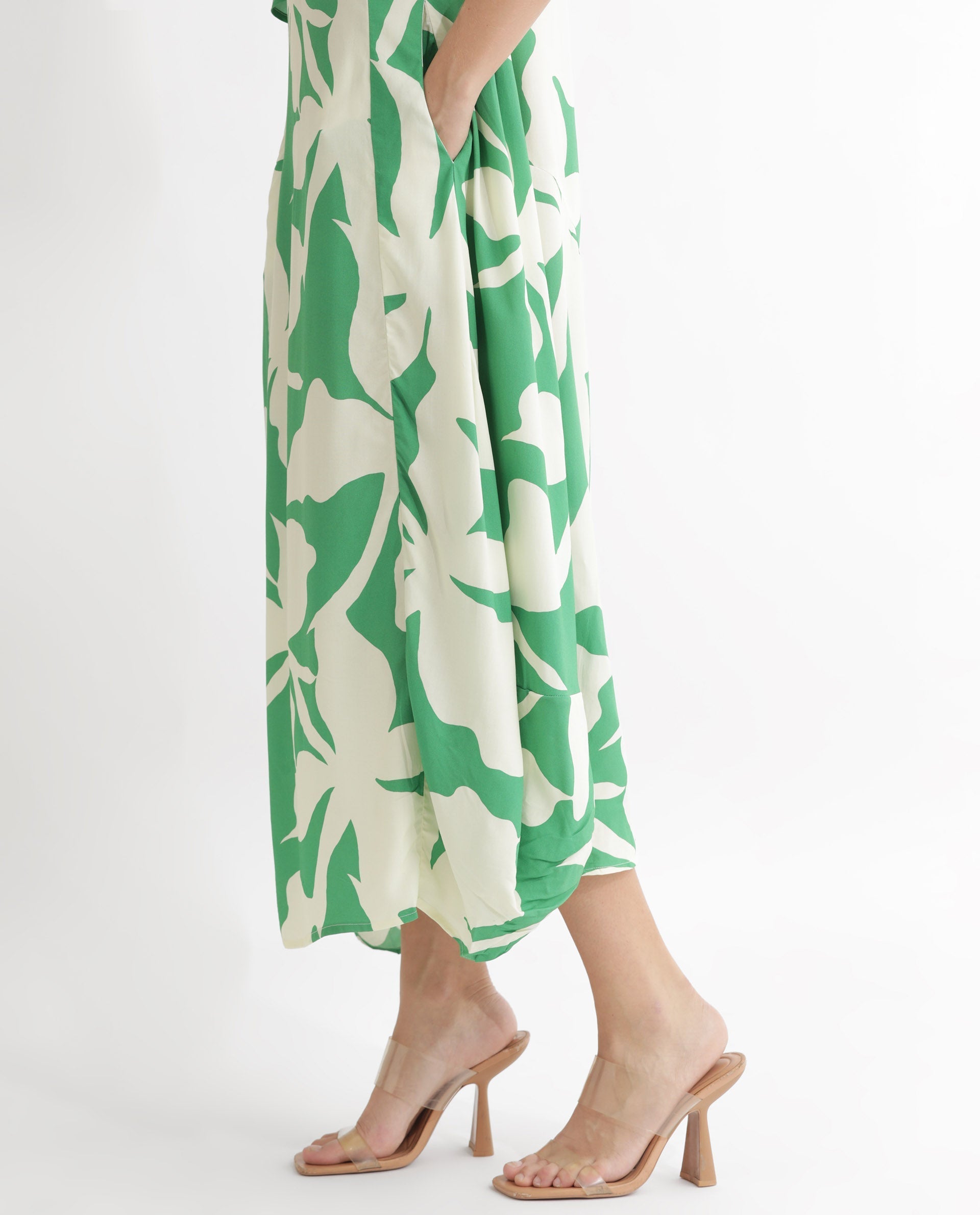 Rareism Women Slager Green Abstract Print Round Neck With Key Hole Button Half Sleeves And Pocket Midi Dress