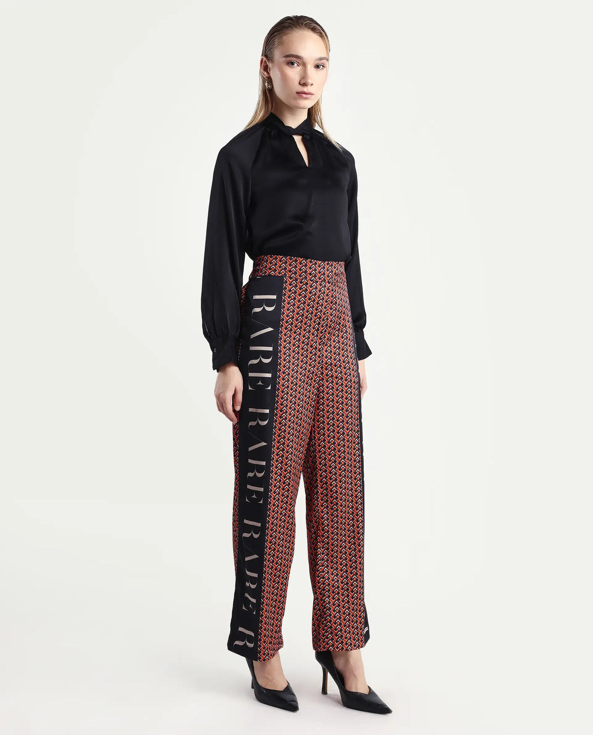 Rareism Women's Streif Orange Polyester Geometric Print Ankle Length Relaxed Fit Trouser