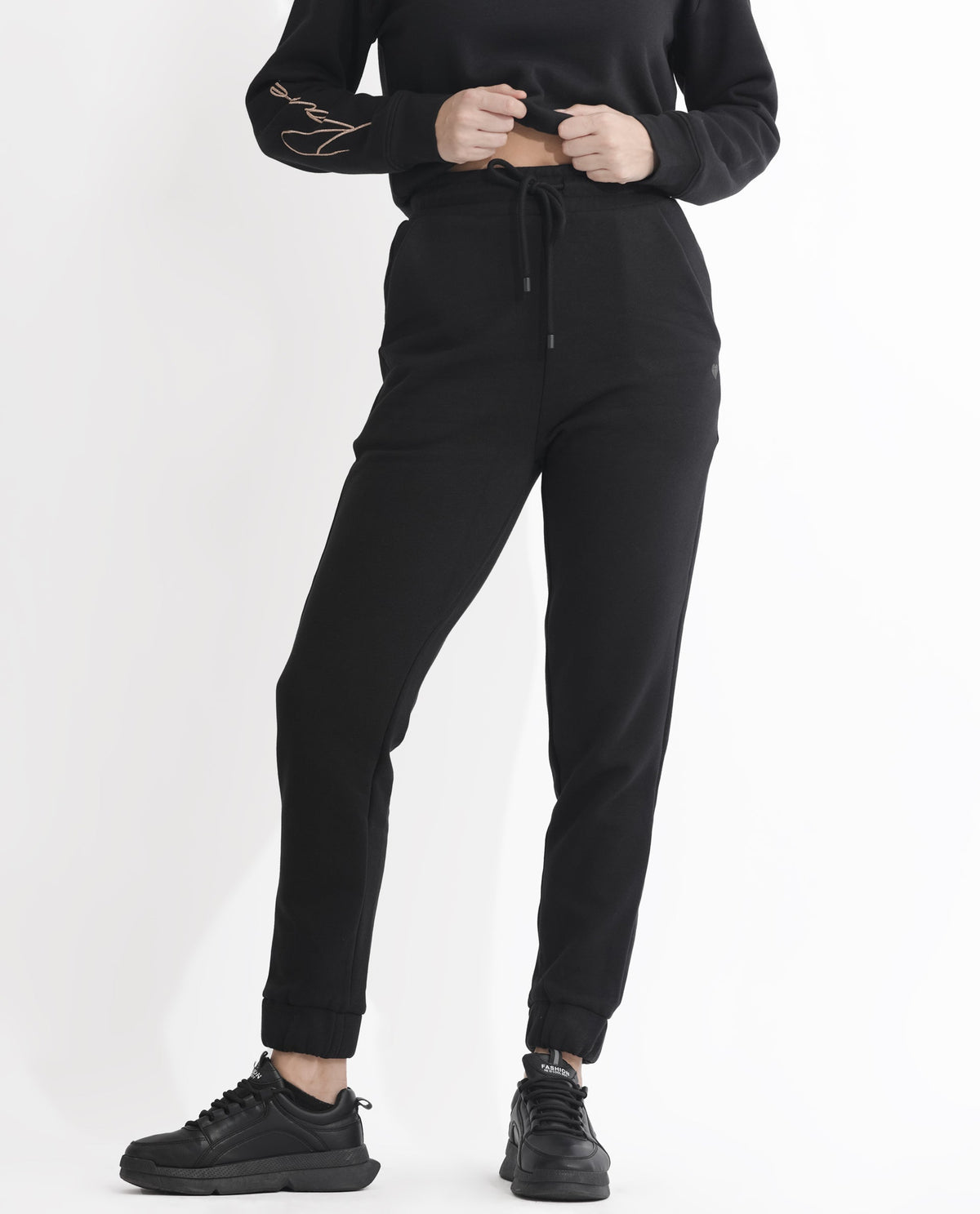 Rareism Women Terac F Black Poly Cotton Fabric Regular Fit Solid Mid Rise Ankle Length Track Pant
