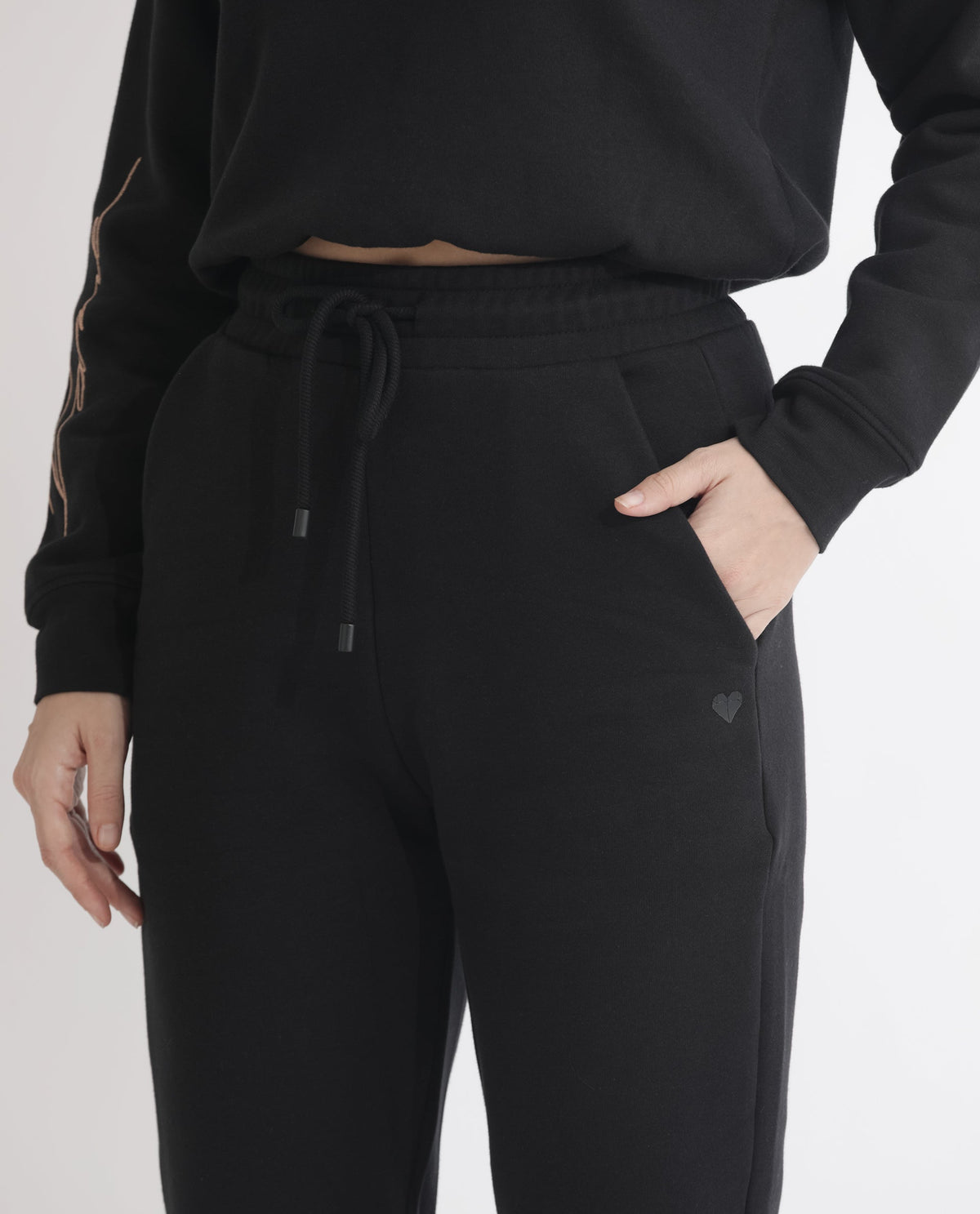 Rareism Women Terac F Black Poly Cotton Fabric Regular Fit Solid Mid Rise Ankle Length Track Pant