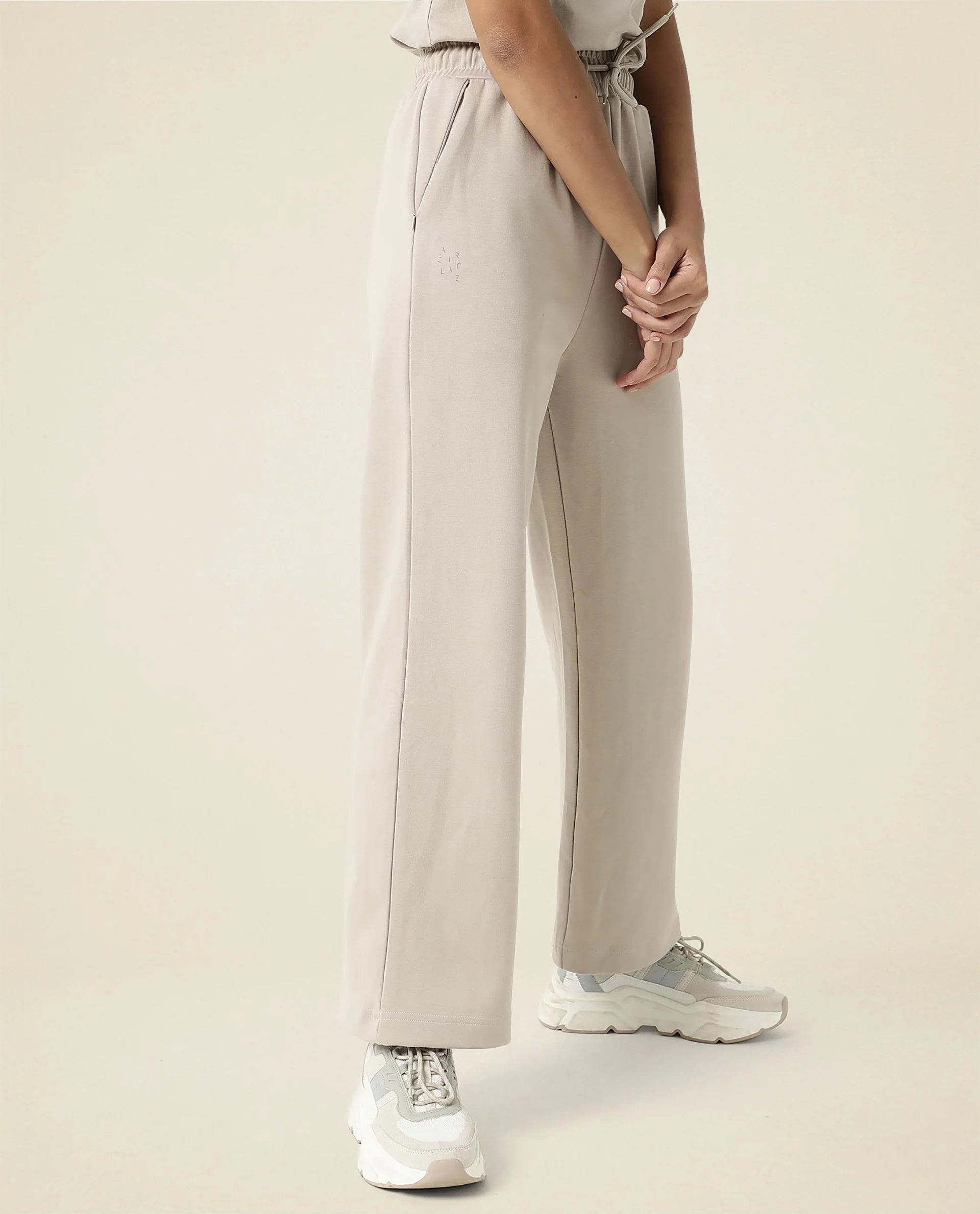 Rareism Women Capsule Beige Cotton Blend Fabric Relaxed Fit Solid Mid Rise Ankle Length Track Pant