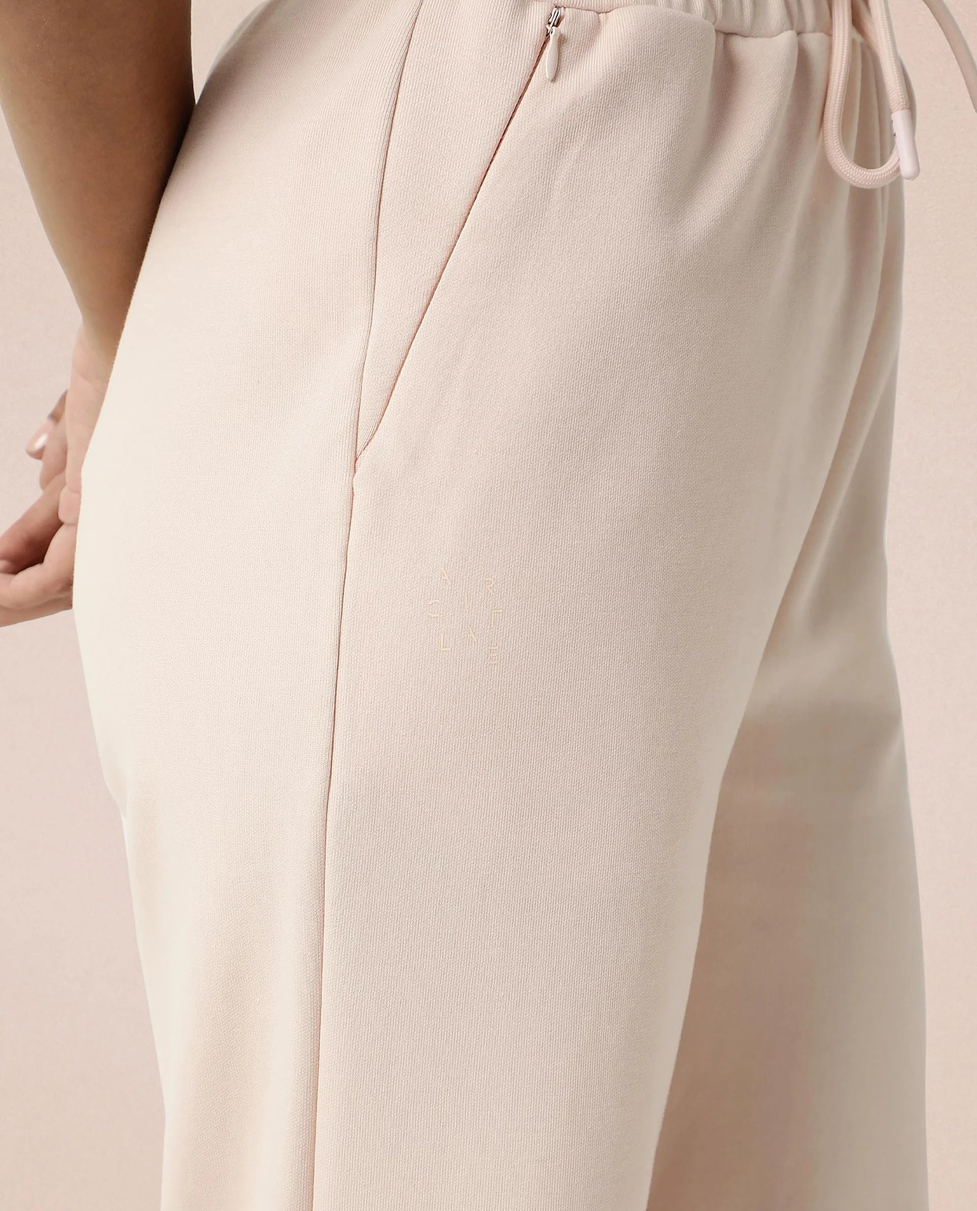 Rareism Women Capsule Pink Cotton Blend Fabric Relaxed Fit Solid Mid Rise Ankle Length Track Pant