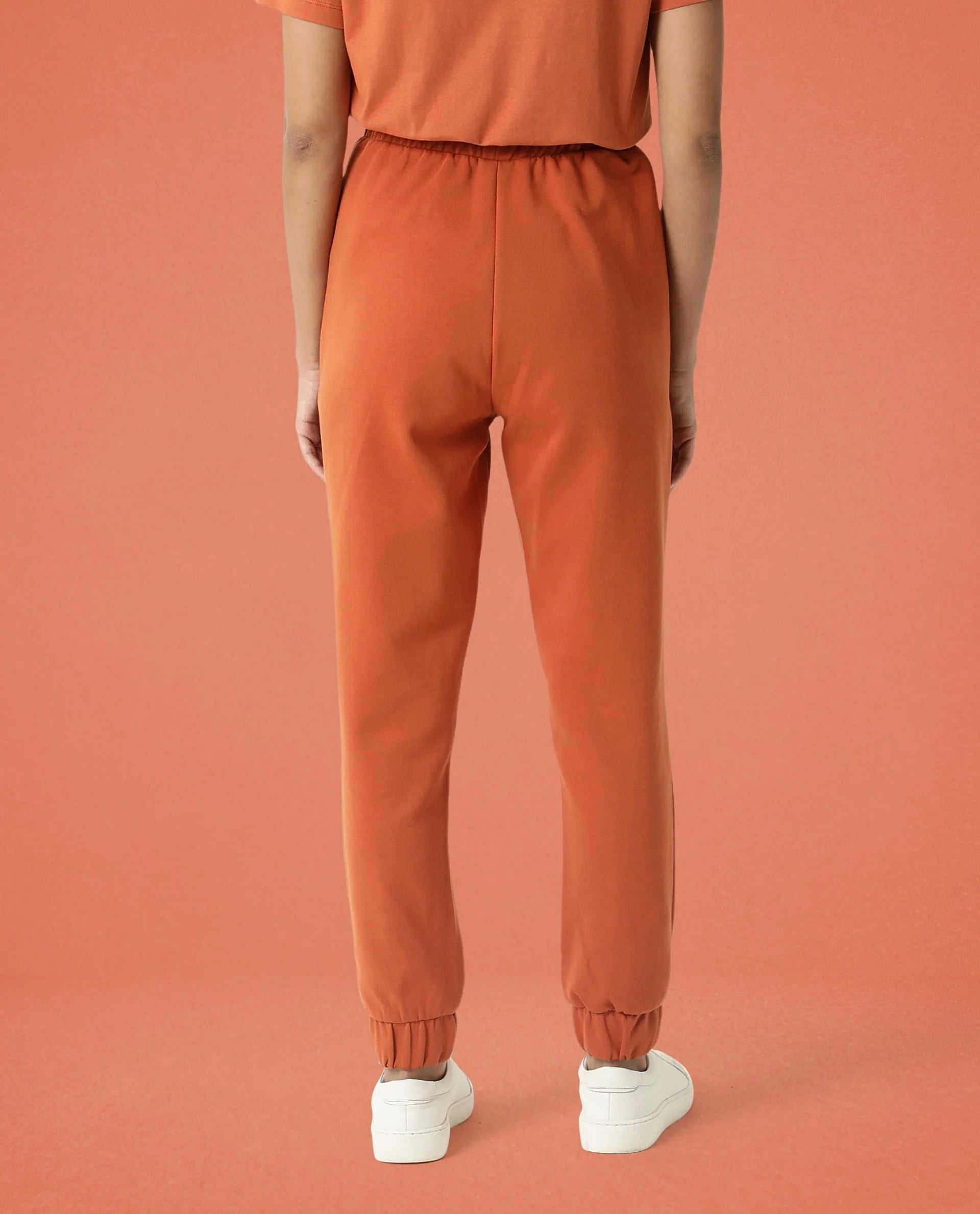 Rareism Women Creta Orange Cotton Blend Fabric Relaxed Fit Solid Mid Rise Ankle Length Track Pant