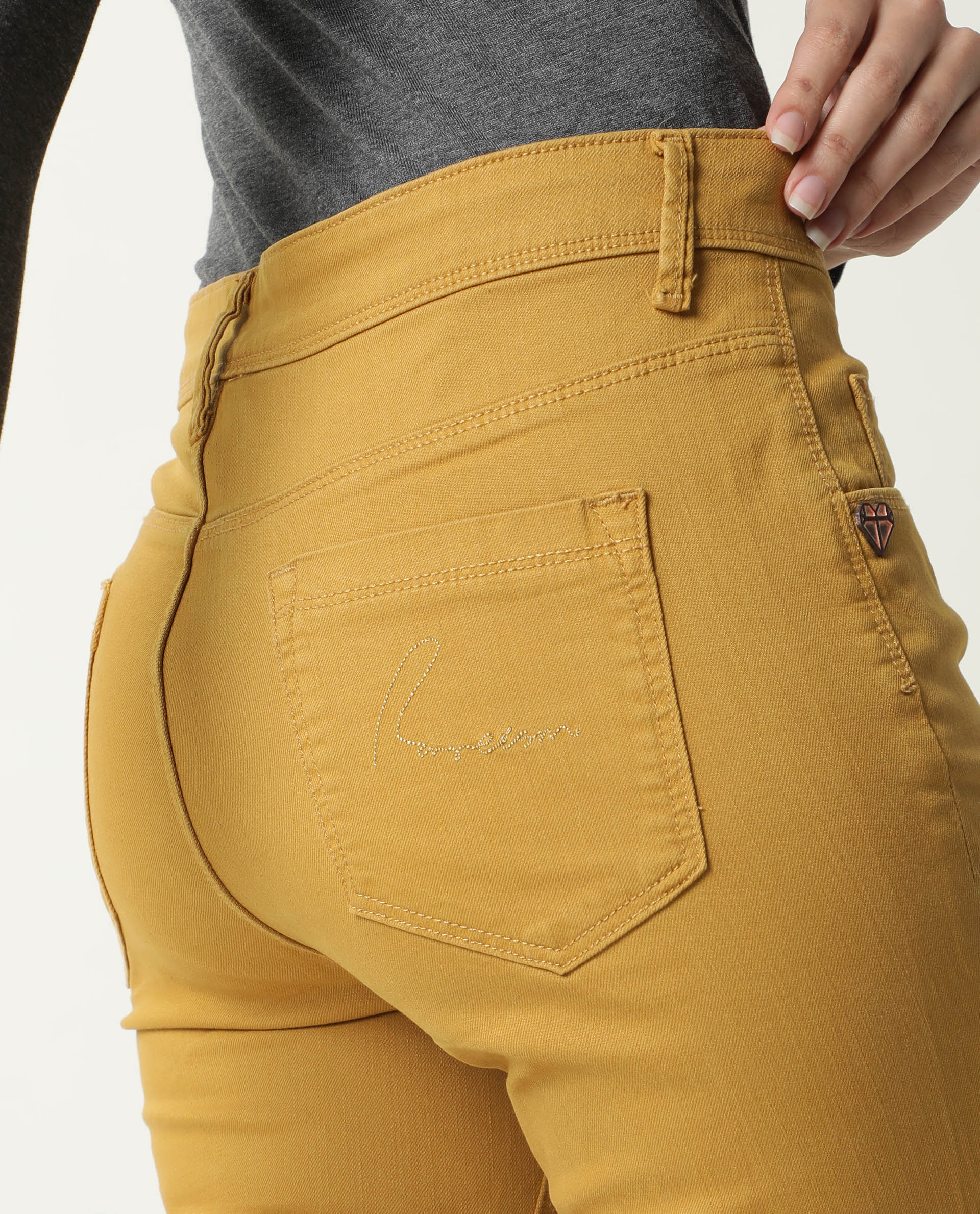 Rareism Women Metty Mustard Cotton Lycra Fabric Mid Rise Solid Slim Fit Ankle Length Jeans