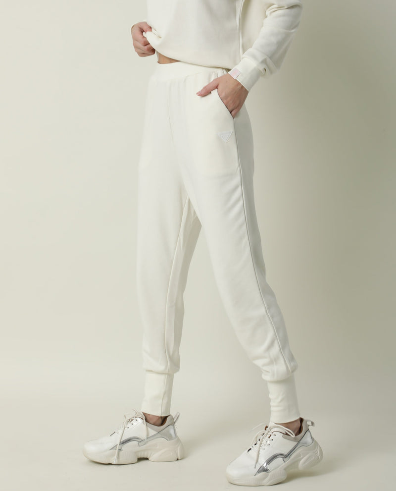 Rareism Women Simp-1 Off White Poly Cotton Fabric Tailored Fit Solid Mid Rise Ankle Length Track Pant