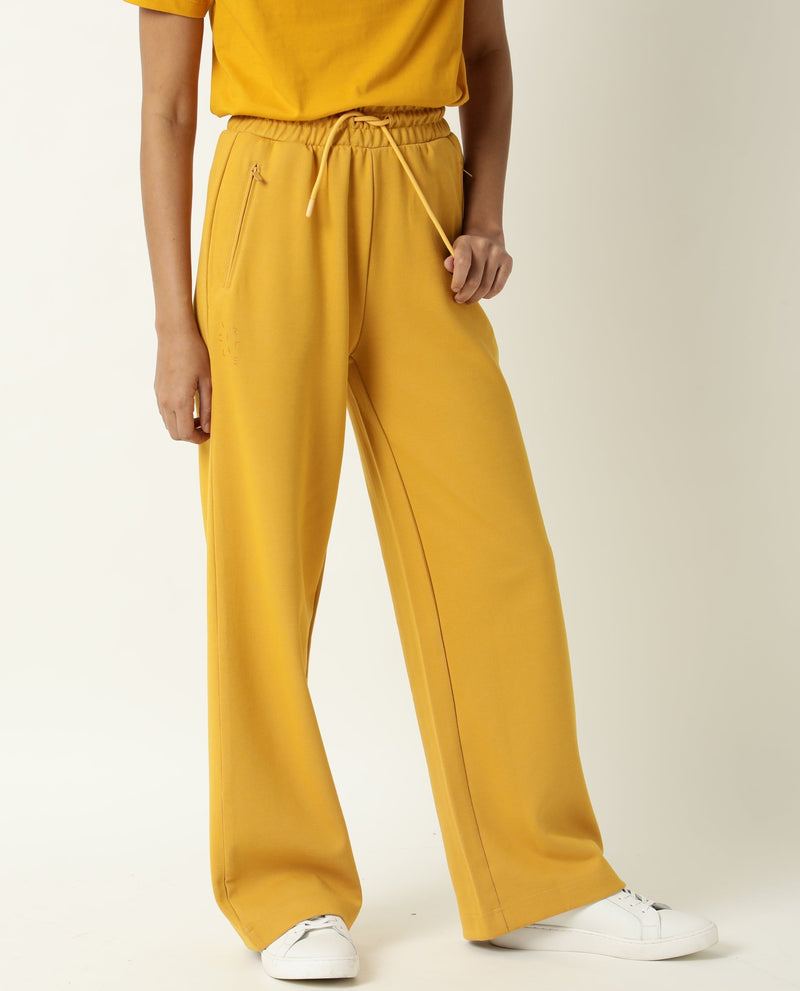 Rareism Women Capsule Mustard Cotton Blend Fabric Relaxed Fit Solid Mid Rise Ankle Length Track Pant