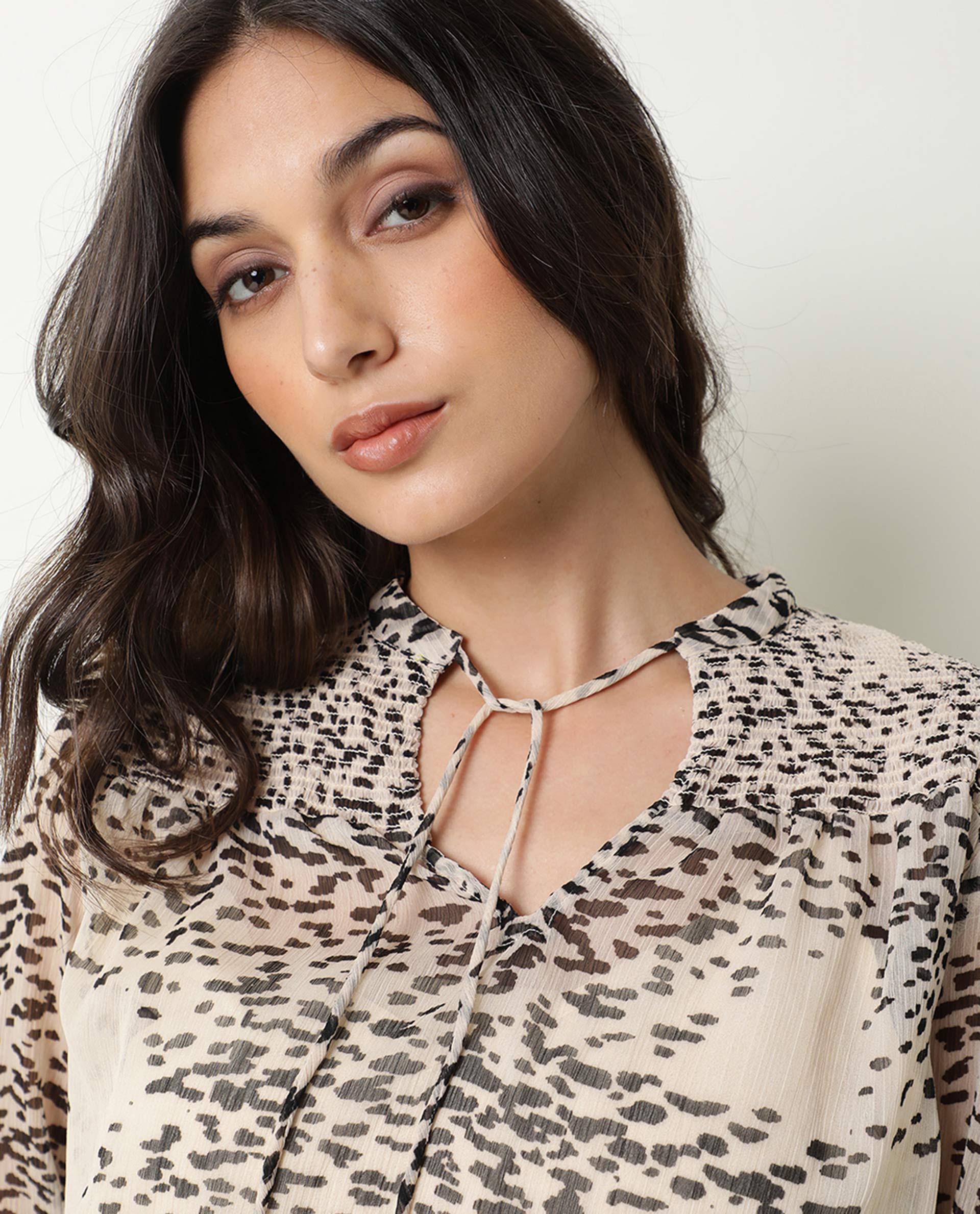 Rareism Women Claude Light Beige Polyester Fabric Regular Fit Tie-Up Neck Full Sleeves Abstract Print Top