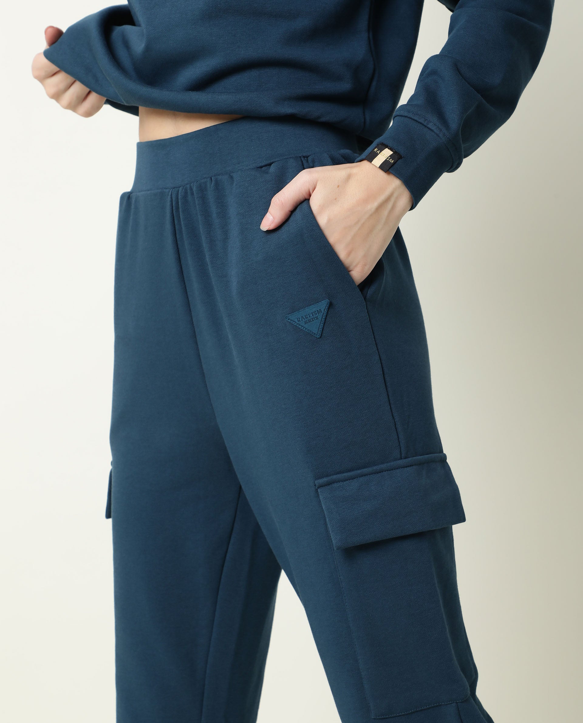 Rareism Women Nush-1 Petrol Poly Cotton Fabric Regular Fit Solid Mid Rise Ankle Length Track Pant