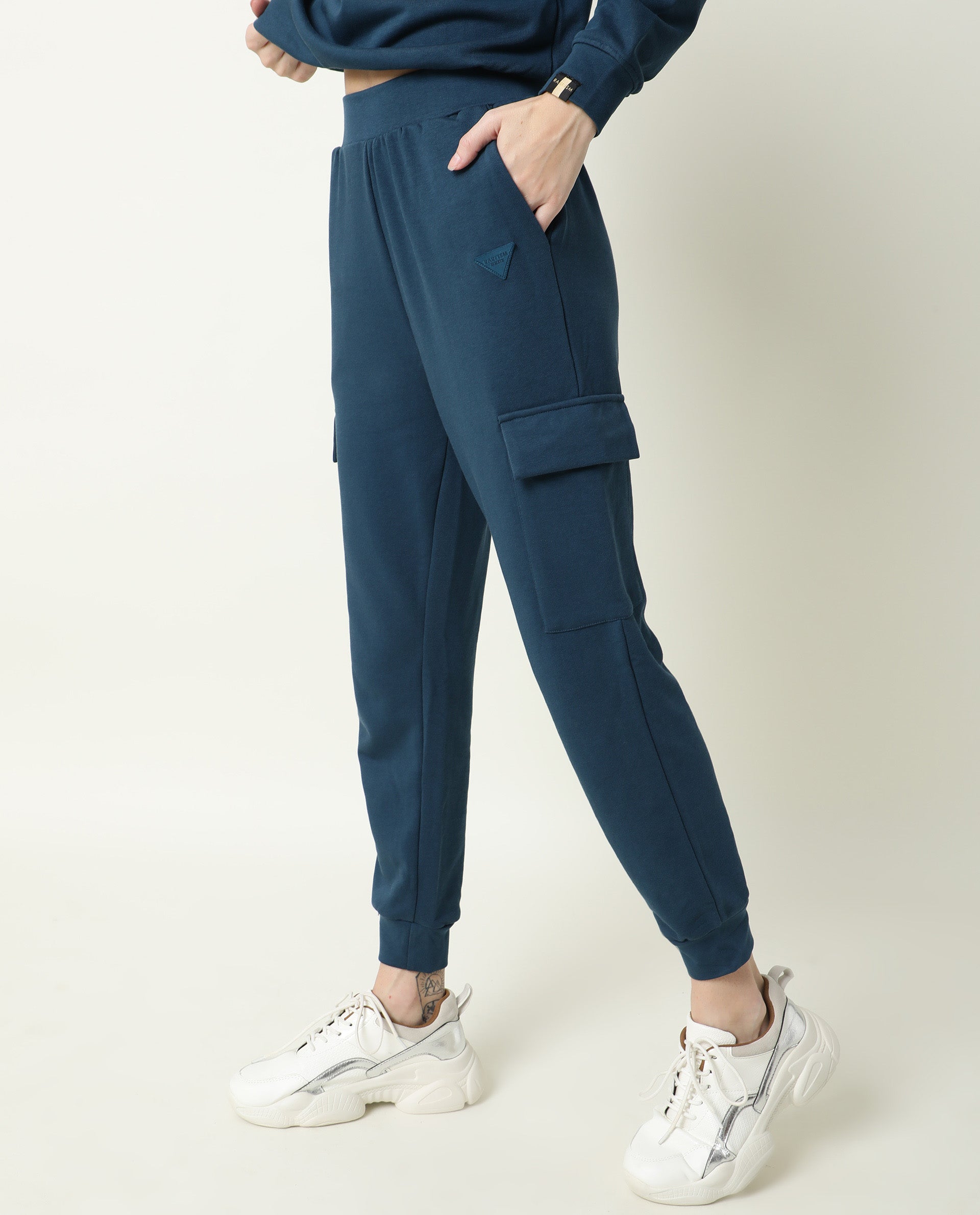 Rareism Women Nush-1 Petrol Poly Cotton Fabric Regular Fit Solid Mid Rise Ankle Length Track Pant