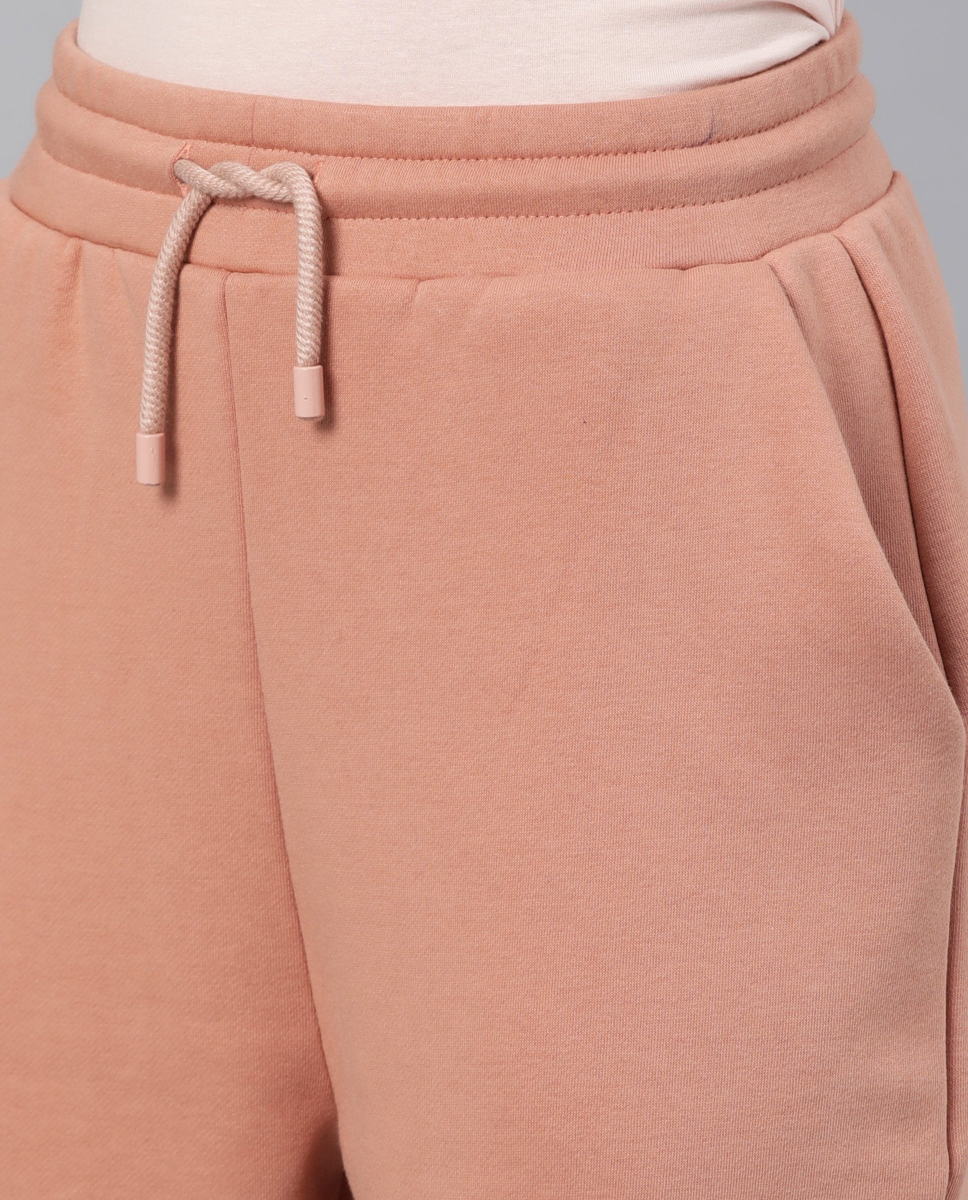 Rareism Women Neo Orange Poly Cotton Fabric Tailored Fit Solid Mid Rise Ankle Length Track Pant