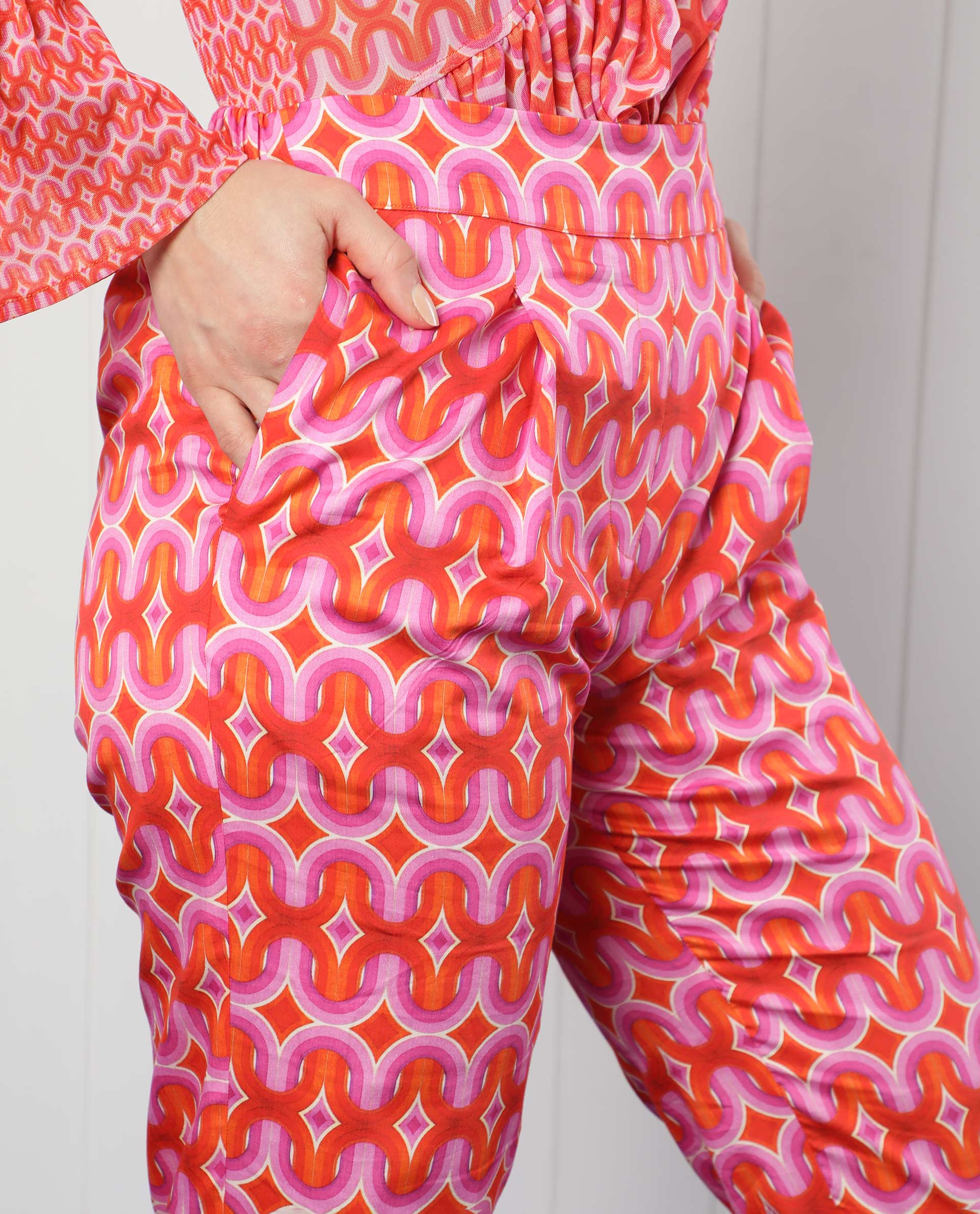 Rareism Women Cremon Orange Cotton Blend Fabric Regular Fit Geometric Print Ankle Length Trousers