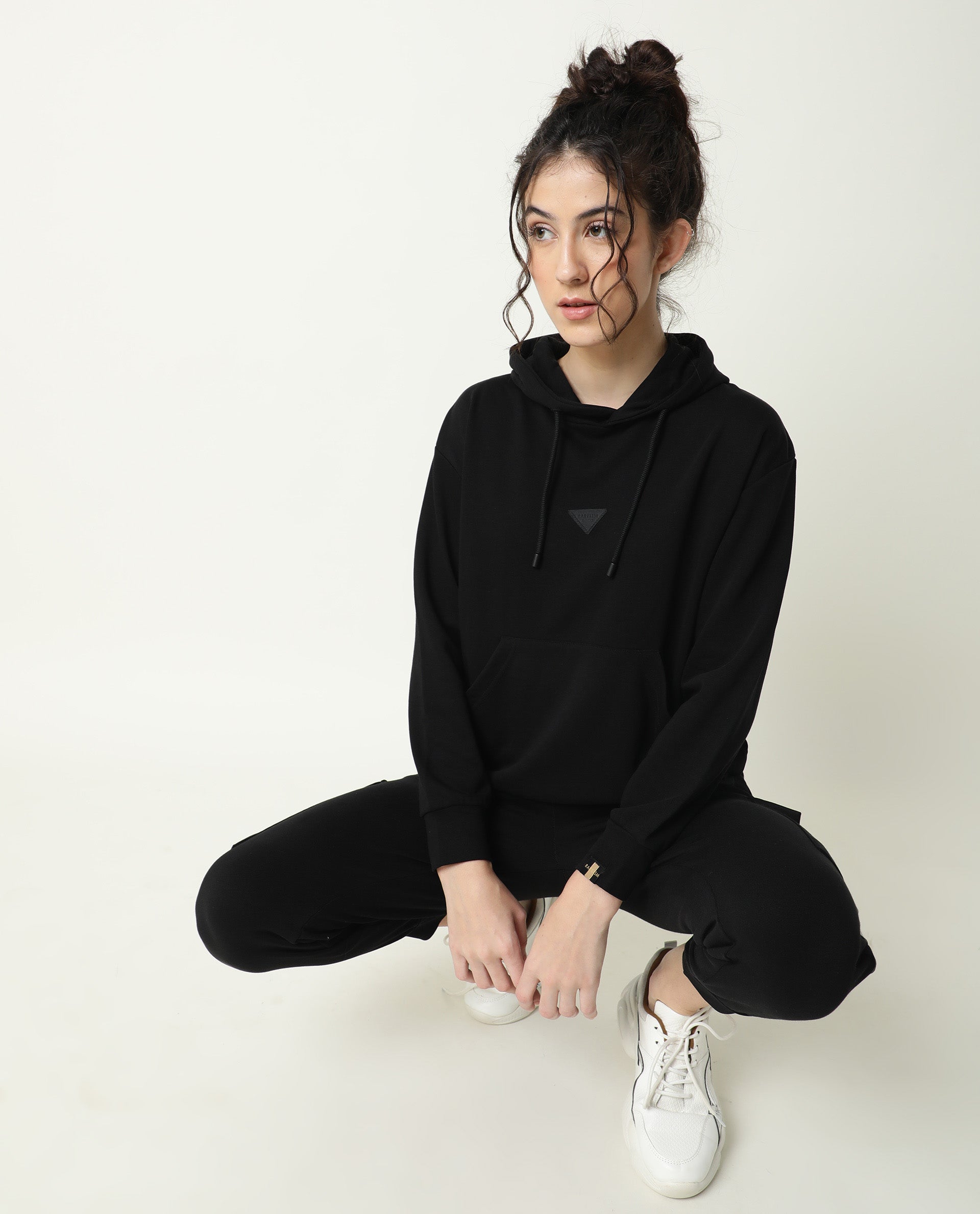 Rareism Women Nush-1 Black Cotton Poly Fabric Tailored Fit Solid Mid Rise Ankle Length Track Pant