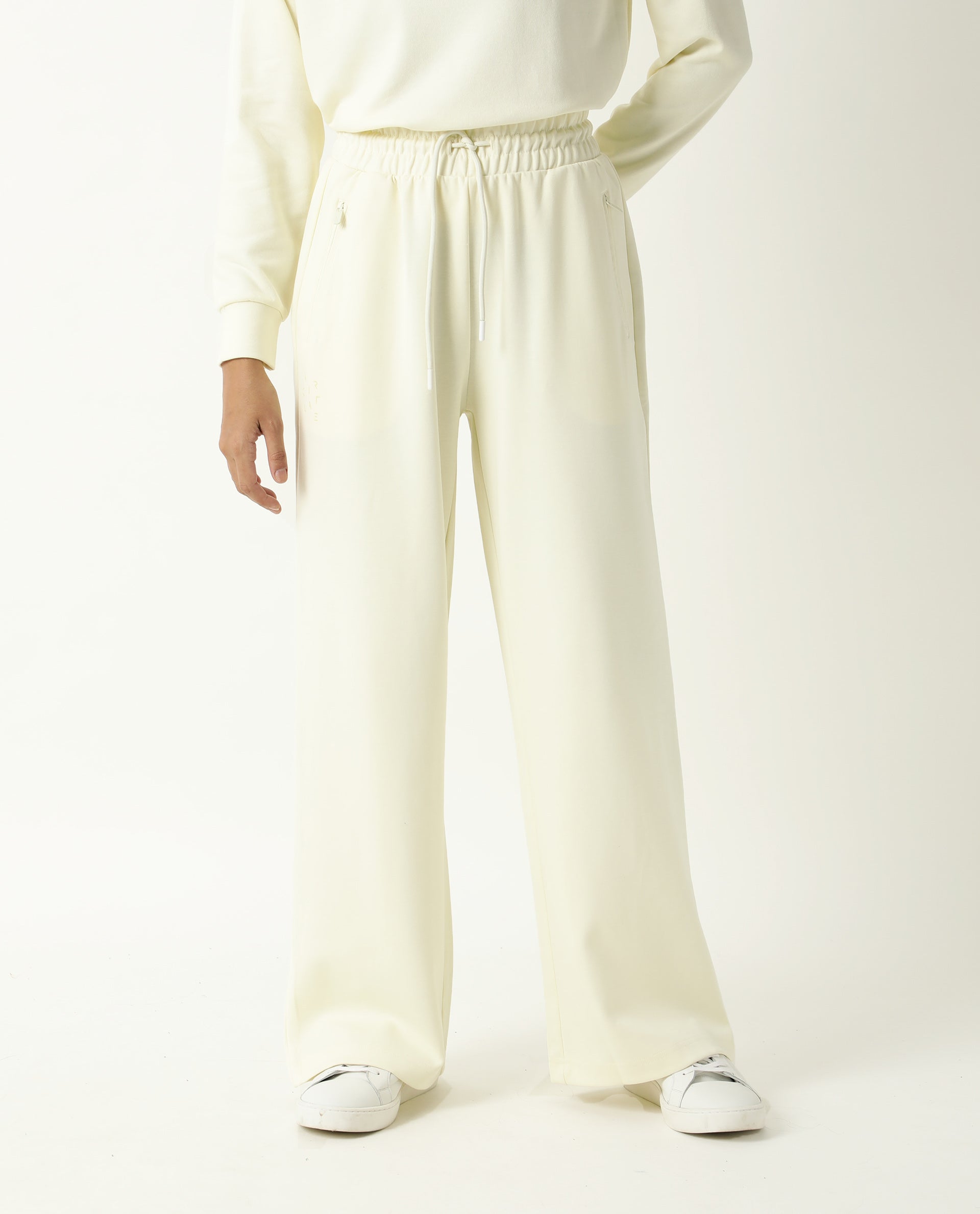 Rareism Women Capsule Light Yellow Cotton Blend Fabric Relaxed Fit Solid Mid Rise Ankle Length Track Pant