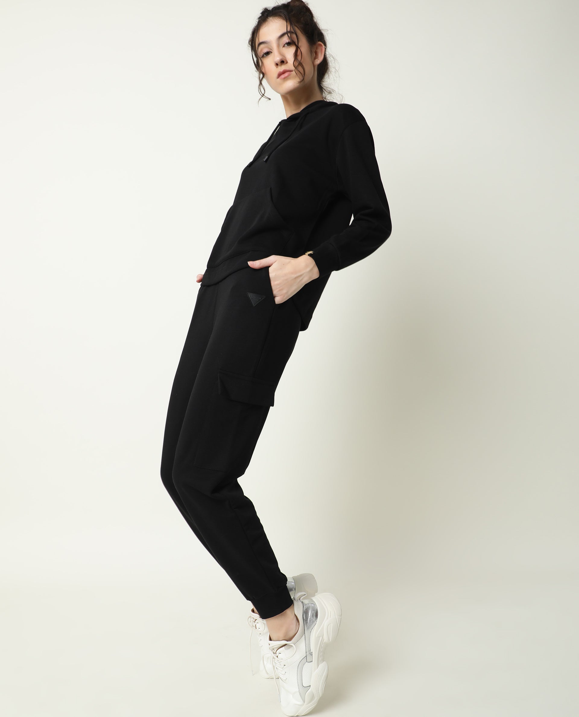 Rareism Women Nush-1 Black Cotton Poly Fabric Tailored Fit Solid Mid Rise Ankle Length Track Pant