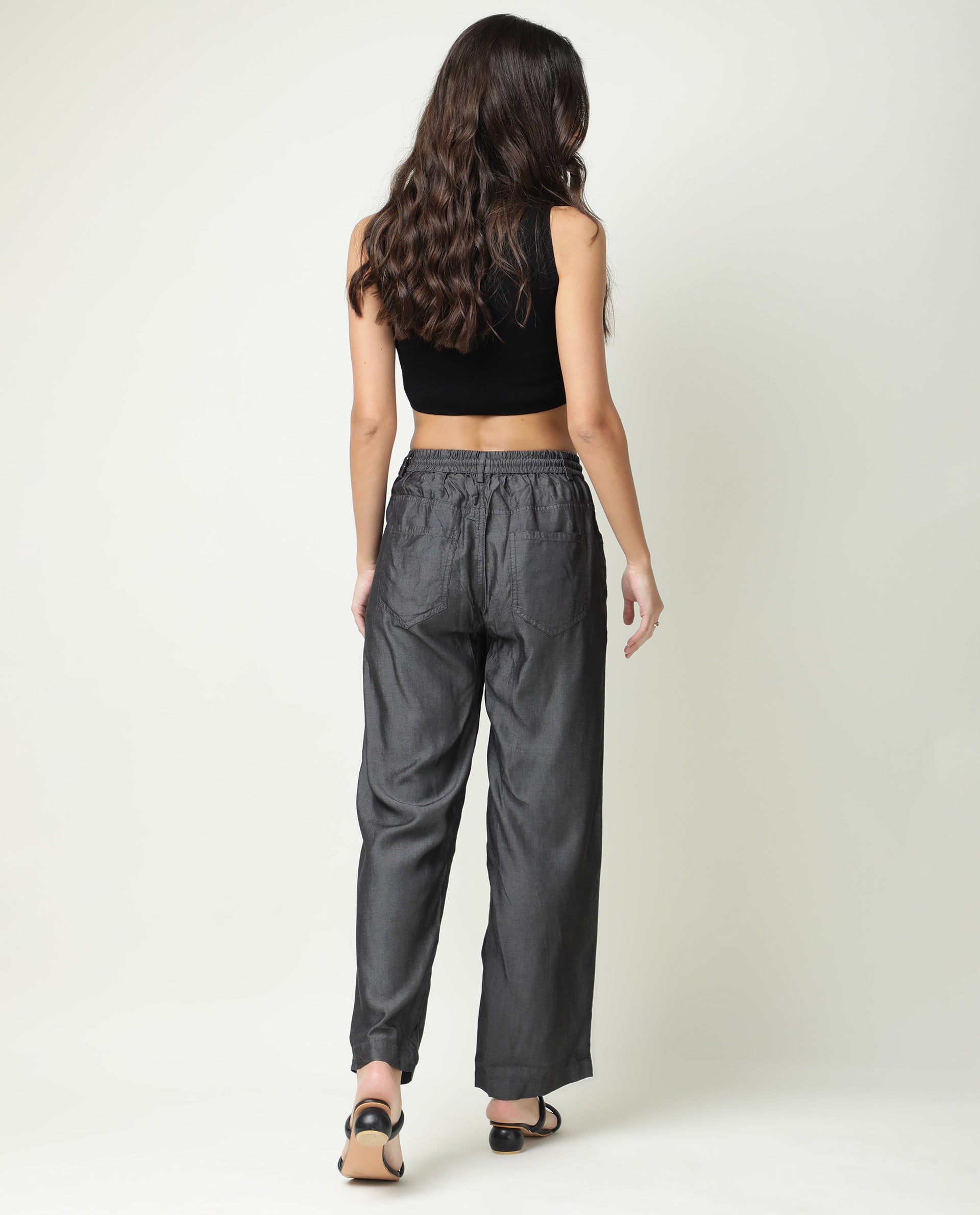 Rareism Women Lipo Black Tencel Fabric Solid Relaxed Fit Ankle Length High Rise Palazzo