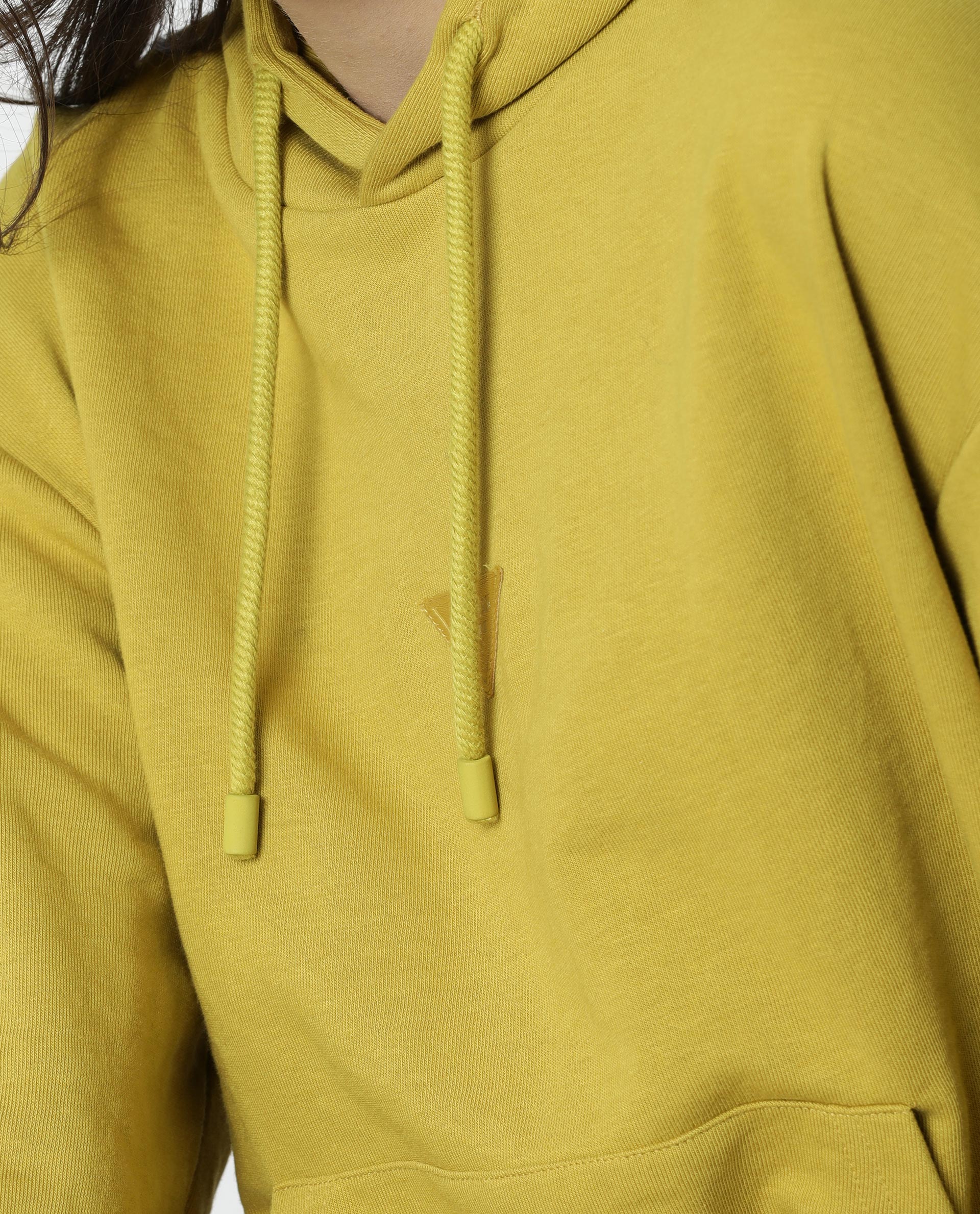 Rareism Women Wally Yellow Cotton Poly Fabric Relaxed Fit Full Sleeves Solid Hooded Sweatshirt